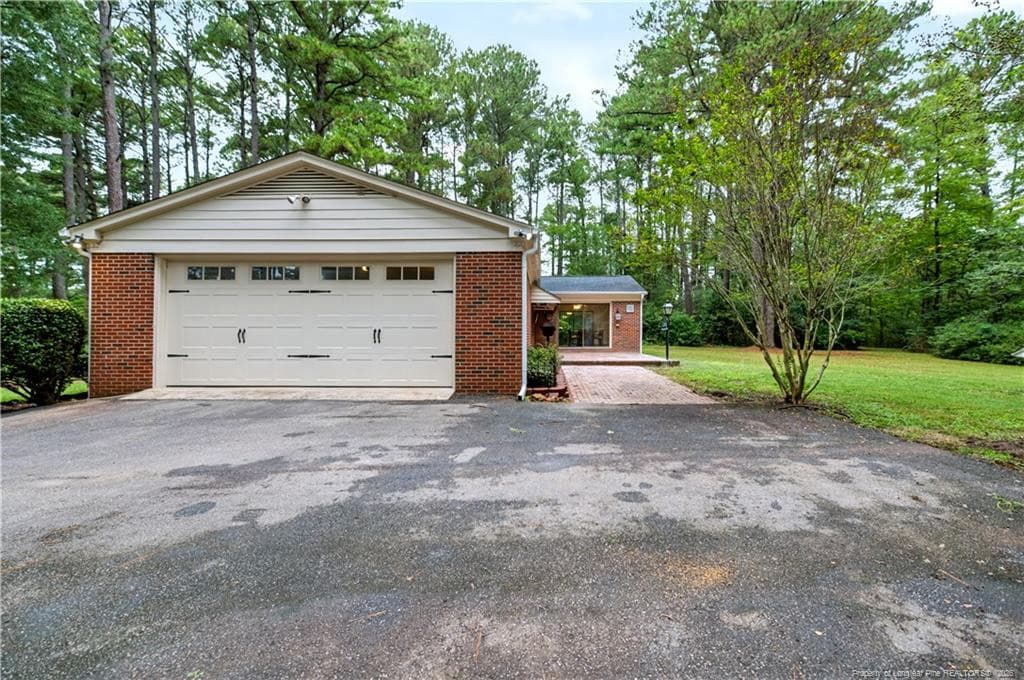 Driveway view toward Garage - 5187 Cox Mill Road, Sanford, NC 27332, Sanford