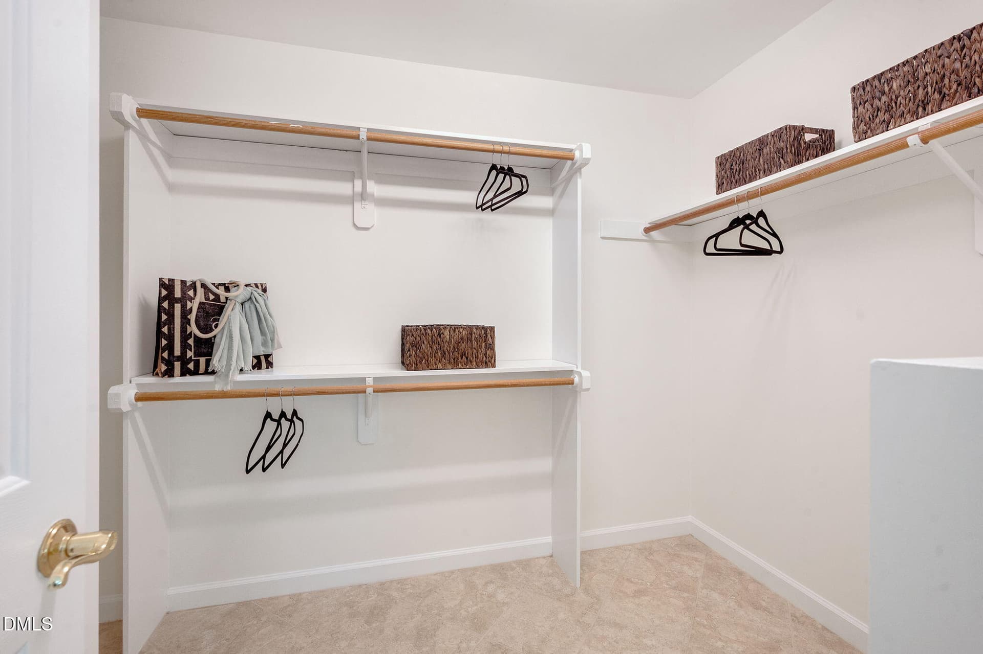 Primary Closet with Tile Flooring - 104 Heck Andrews Way, Cary, NC 27519