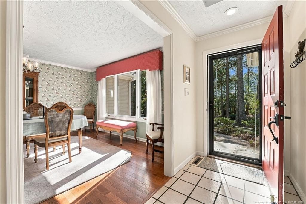 Dining Room Entrance from Foyer - 715 Lake Forest Drive SE, Pinehurst, NC 28374