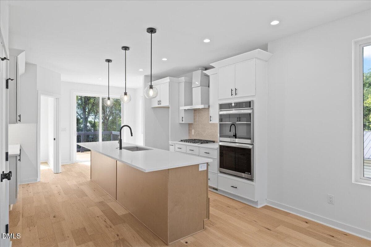 Kitchen overlooks large backyard space - 804 Cotton Place 102, Raleigh, NC 27601