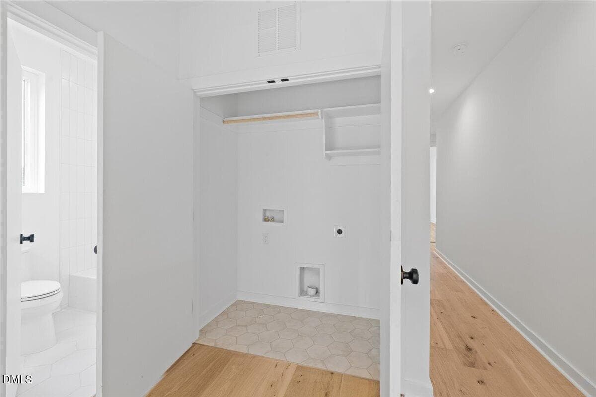 Laundry closet on upper level - 804 Cotton Place 102, Raleigh, NC 27601