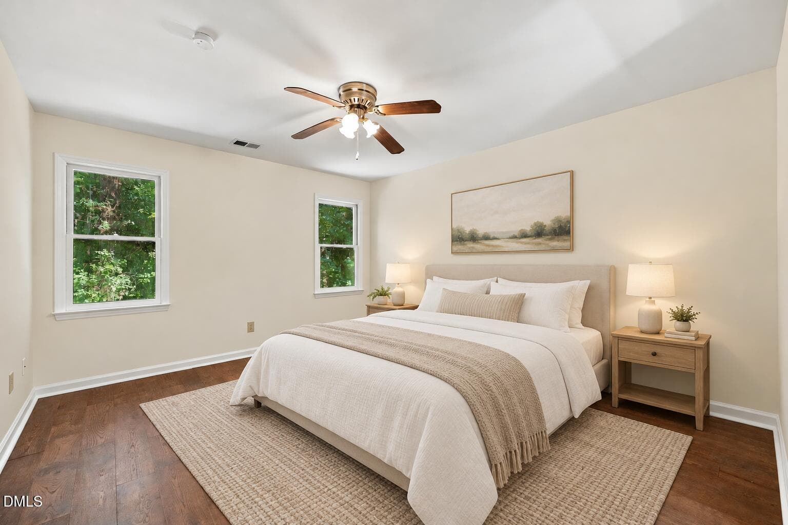 Calm primary bedroom with neutral furnis - 5140 Simmons Branch Trail, Raleigh, NC 27606
