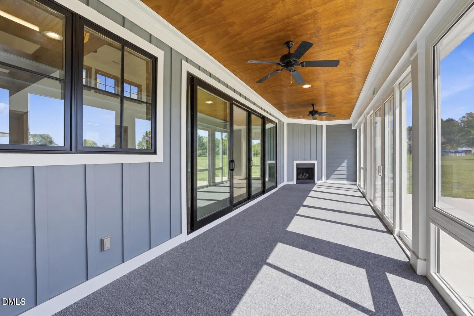 Empty Sunroom with Corner Fireplace-2 - 35 S Rippling Court, Smithfield, NC 27577