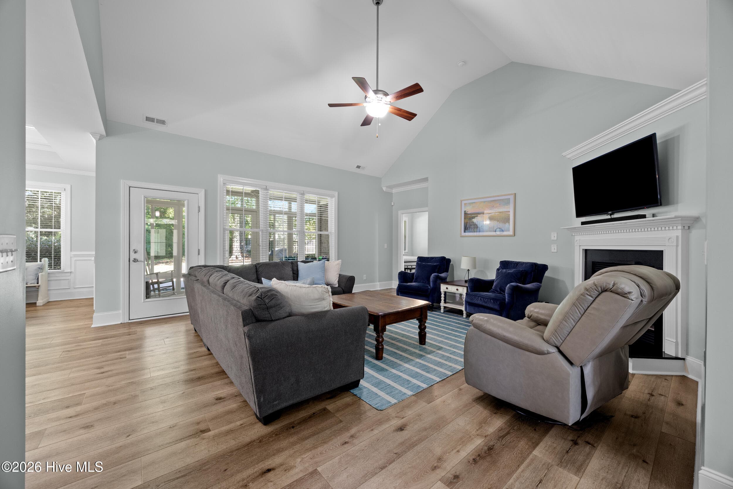 Living Room with gas fireplace - 323 Crown Pointe Drive, Hampstead, NC 28443