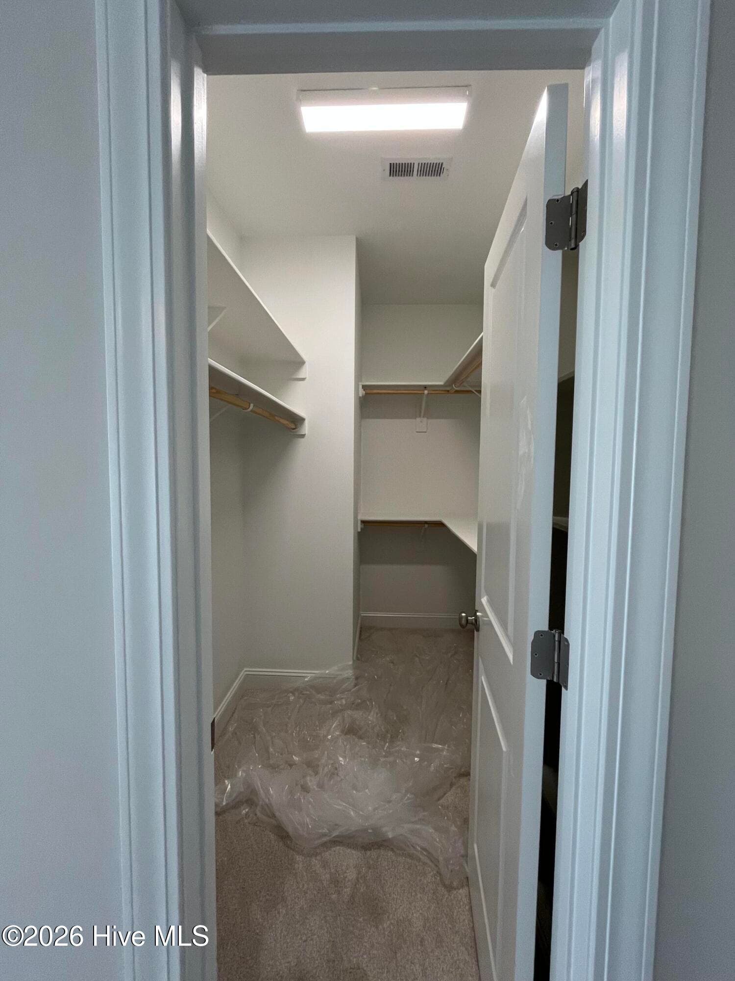 owner walk in custom closet - 3229 Meadow Drive, Farmville, NC 27828