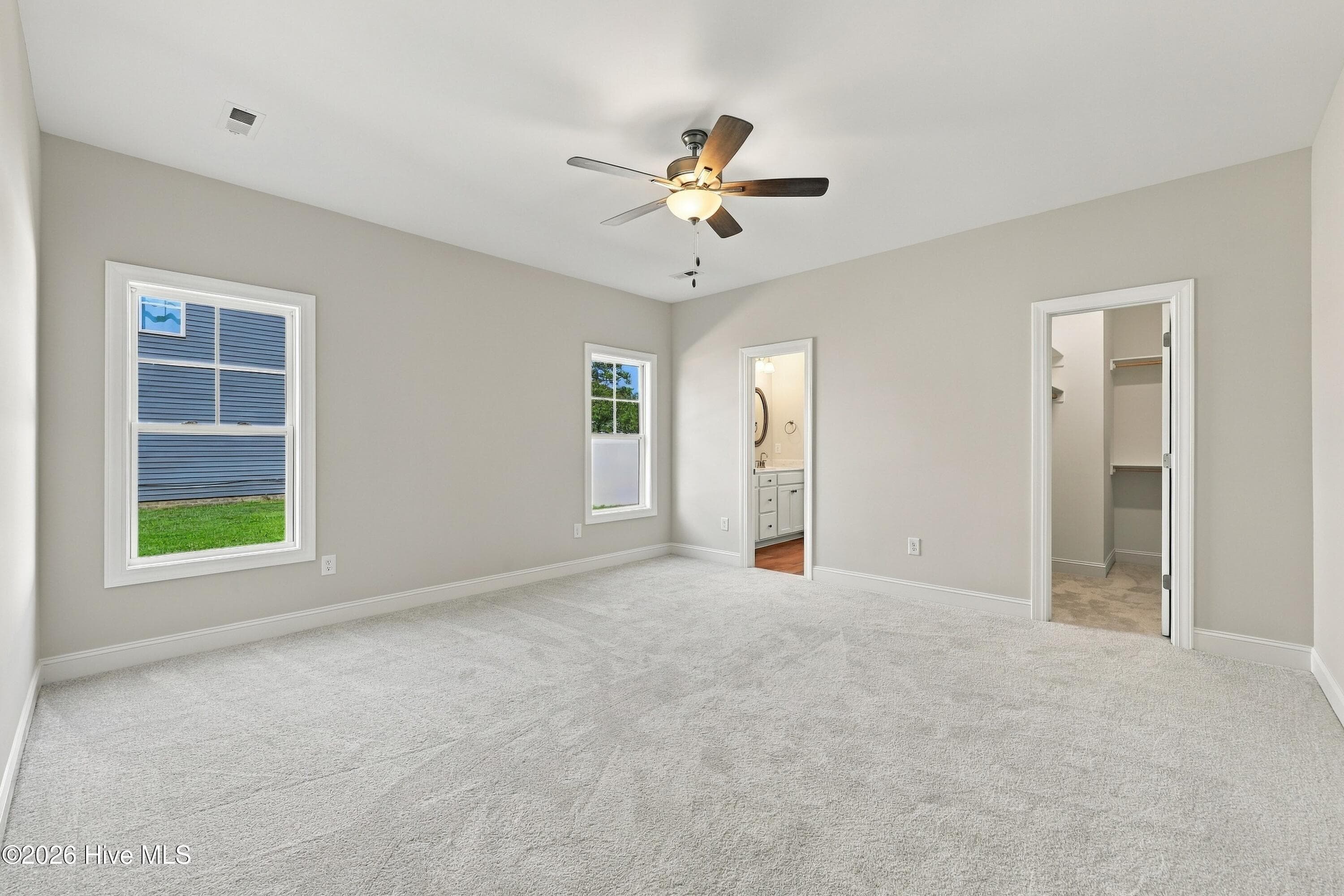 bed 4 is the owner suite ! It is spacious and has an ensuite bath and walk in closet - 3229 Meadow Drive, Farmville, NC 27828
