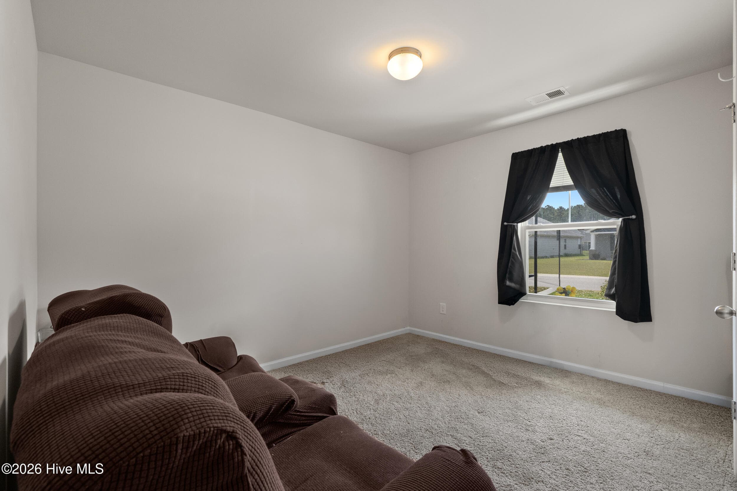 Single Family Residence at 737 Landmark Cove, Carolina Shores, NC 28467, photo 2 of 3