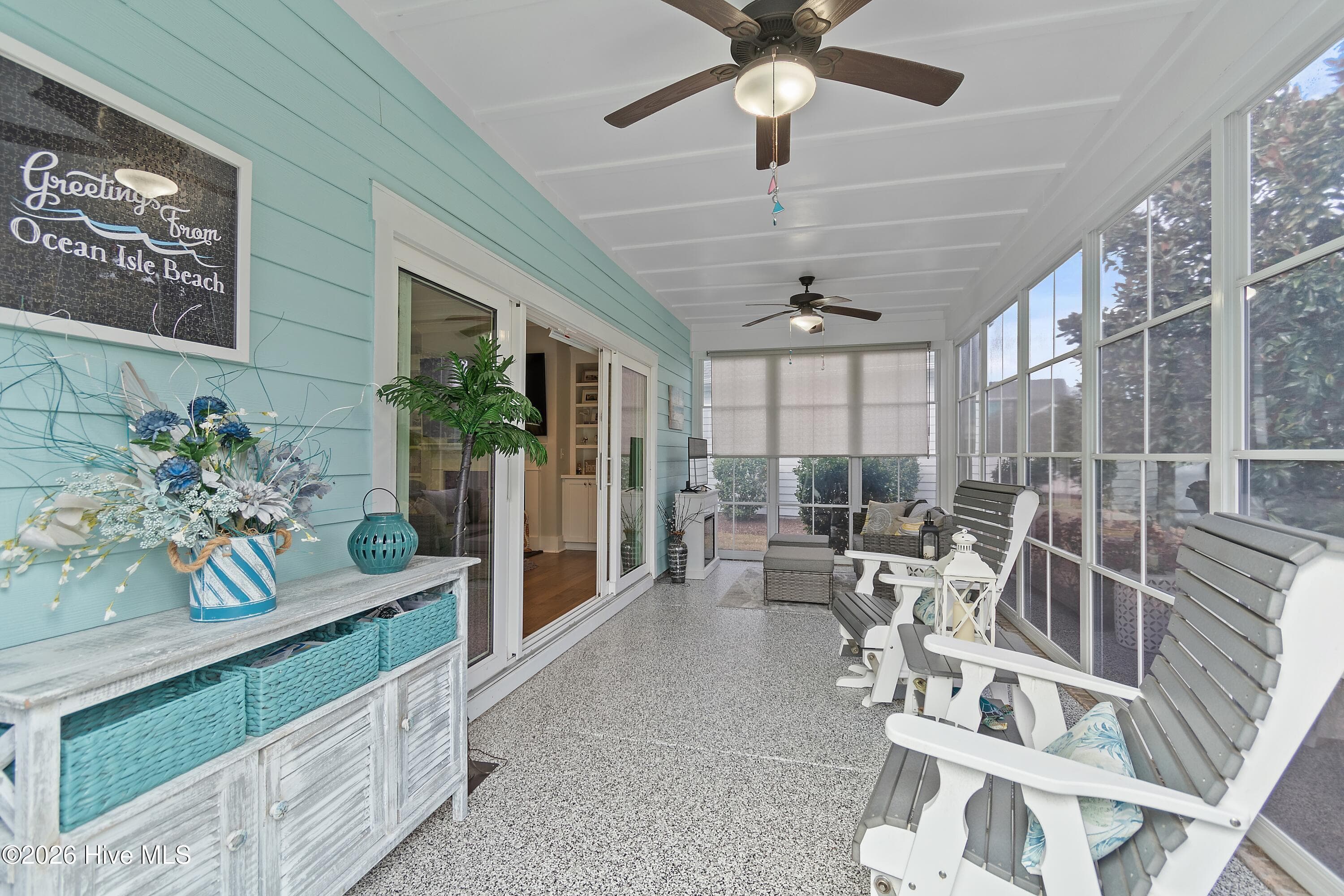 Large EZ Breeze patio with epoxy floors. - 6358 Bryson Drive SW, Ocean Isle Beach, NC 28469