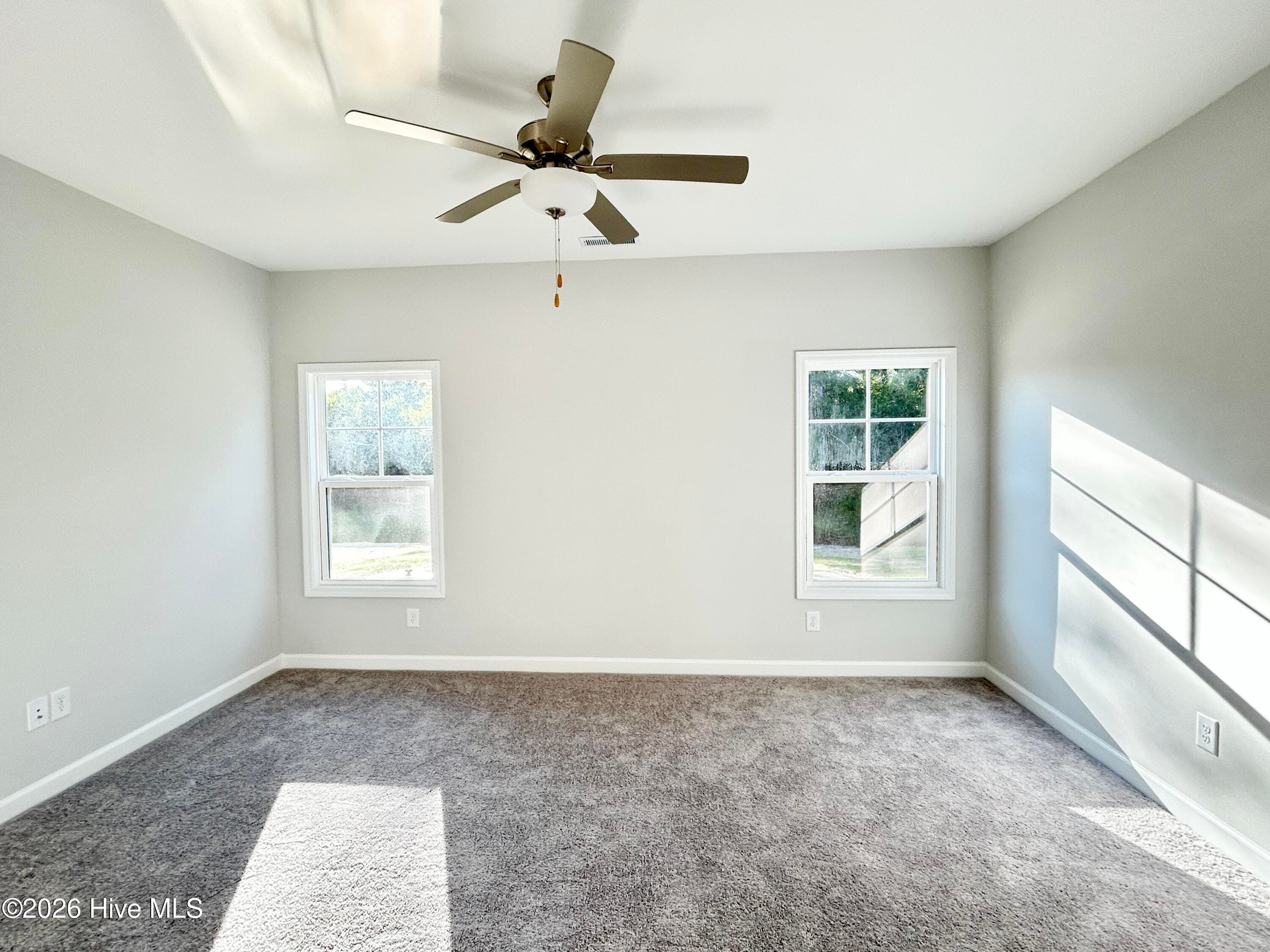 Primary suite features a Private Bathroom with Tile Shower and Large Walk-in Closet - 4149 Workman Loop 67, Leland, NC 28451