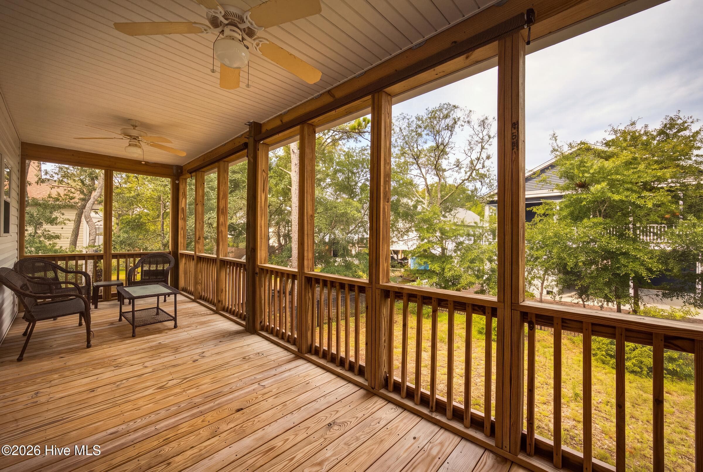 SCREENED BACK PORCH overlooking Back Yard - 225 NE 39th Street, Oak Island, NC 28465