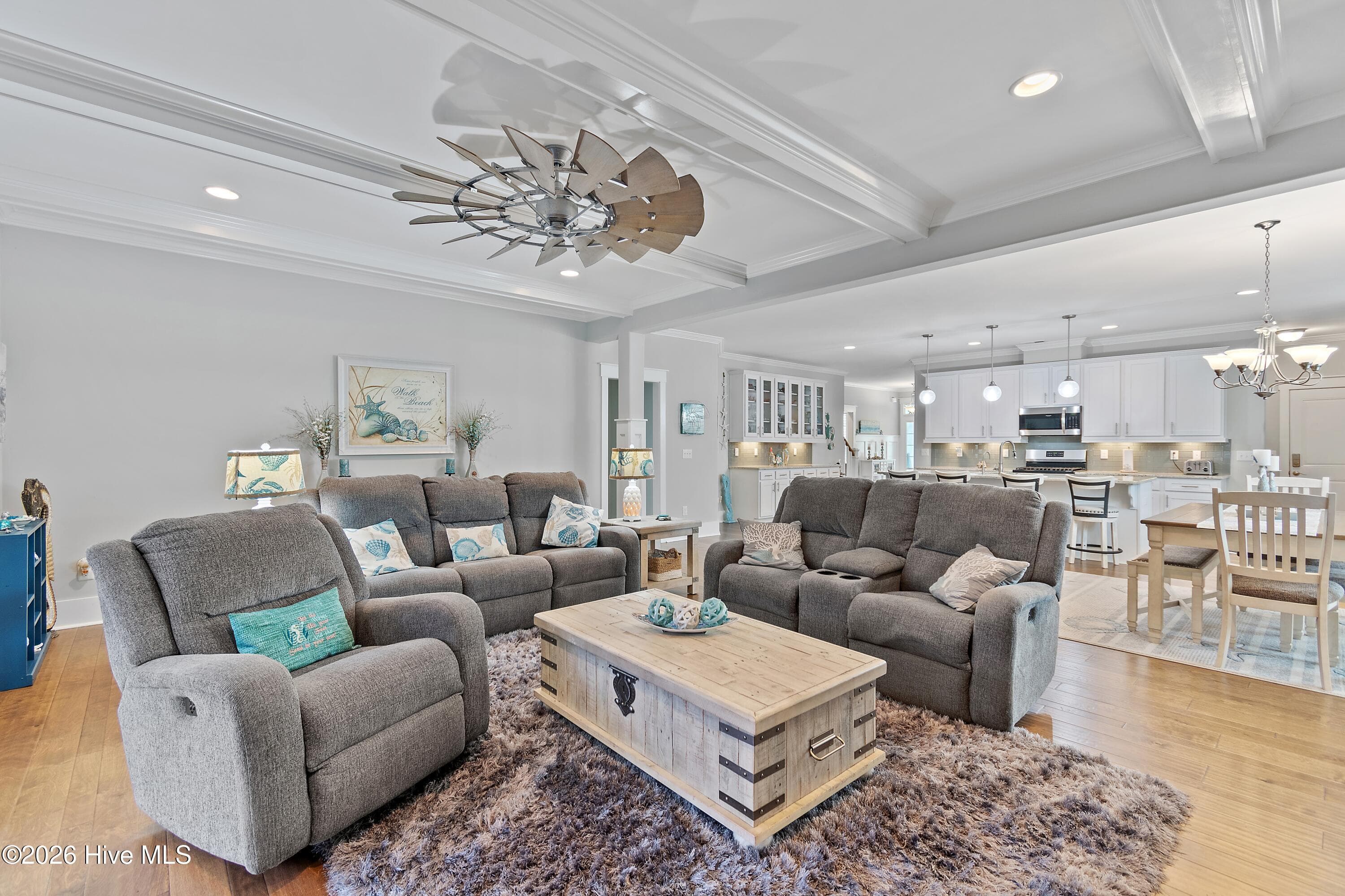 Living room with recessed lighting and beams. - 6358 Bryson Drive SW, Ocean Isle Beach, NC 28469