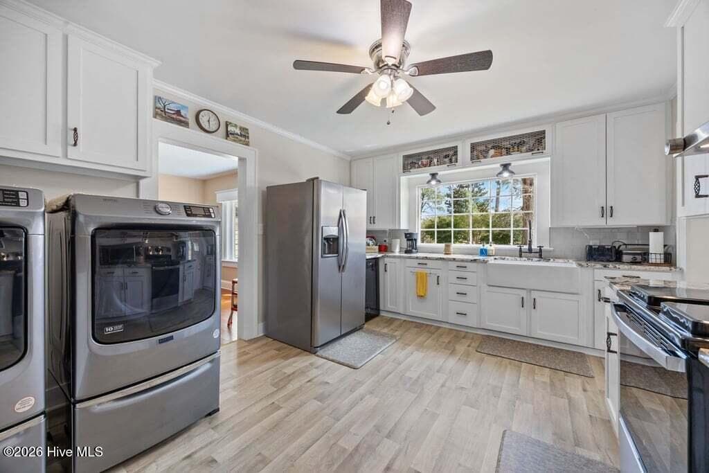 KITCHEN VIEW LOOKING TOWARDS DINING - 1307 N Respess Street, Washington, NC 27889