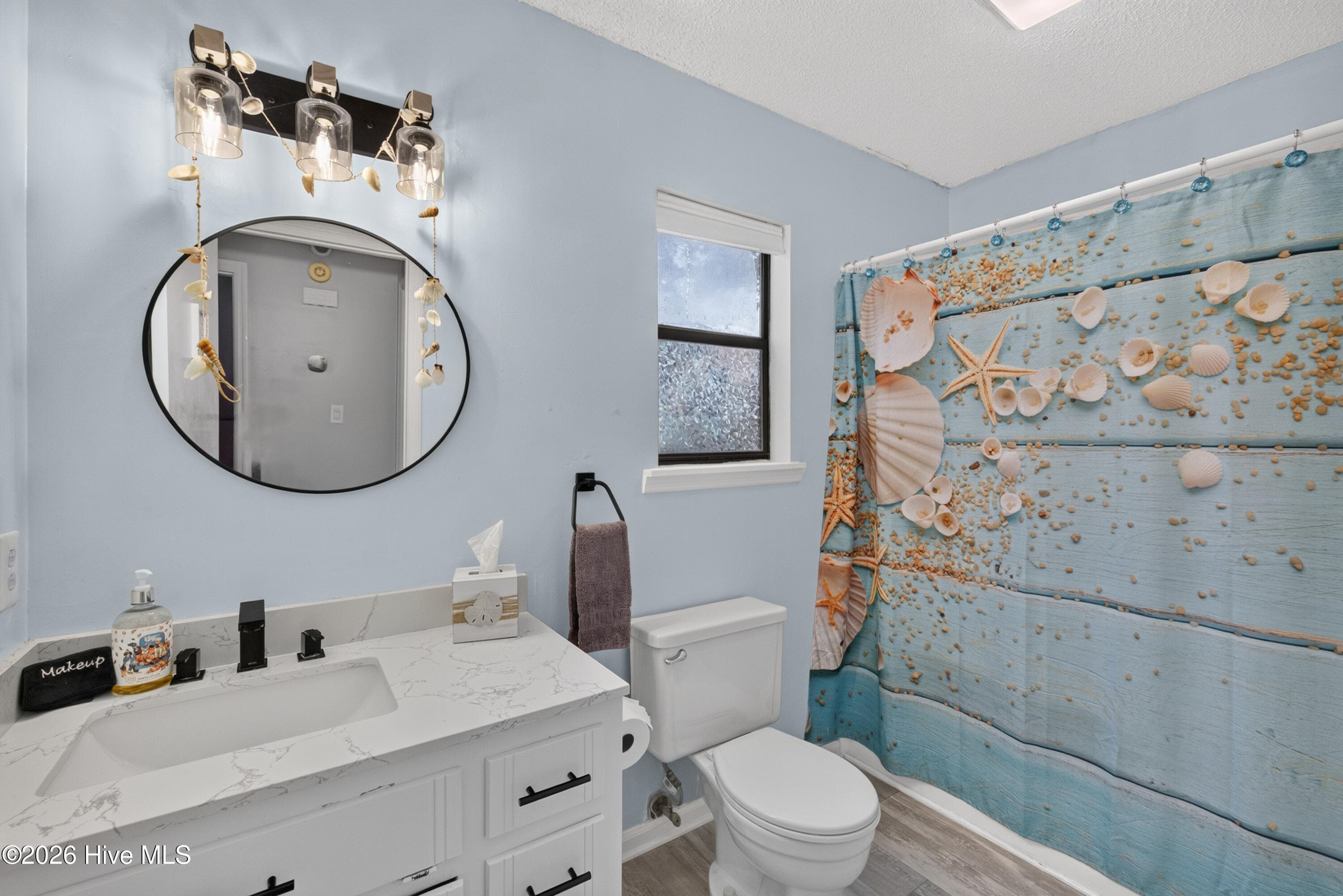 Main level full bath - 301 Bay Circle, North Topsail Beach, NC 28460
