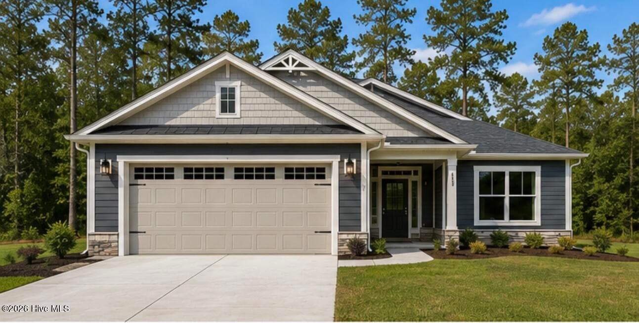 Photo is of a similar home that was completed - 61 Pinewood Drive, Carolina Shores, NC 28467, Carolina Shores