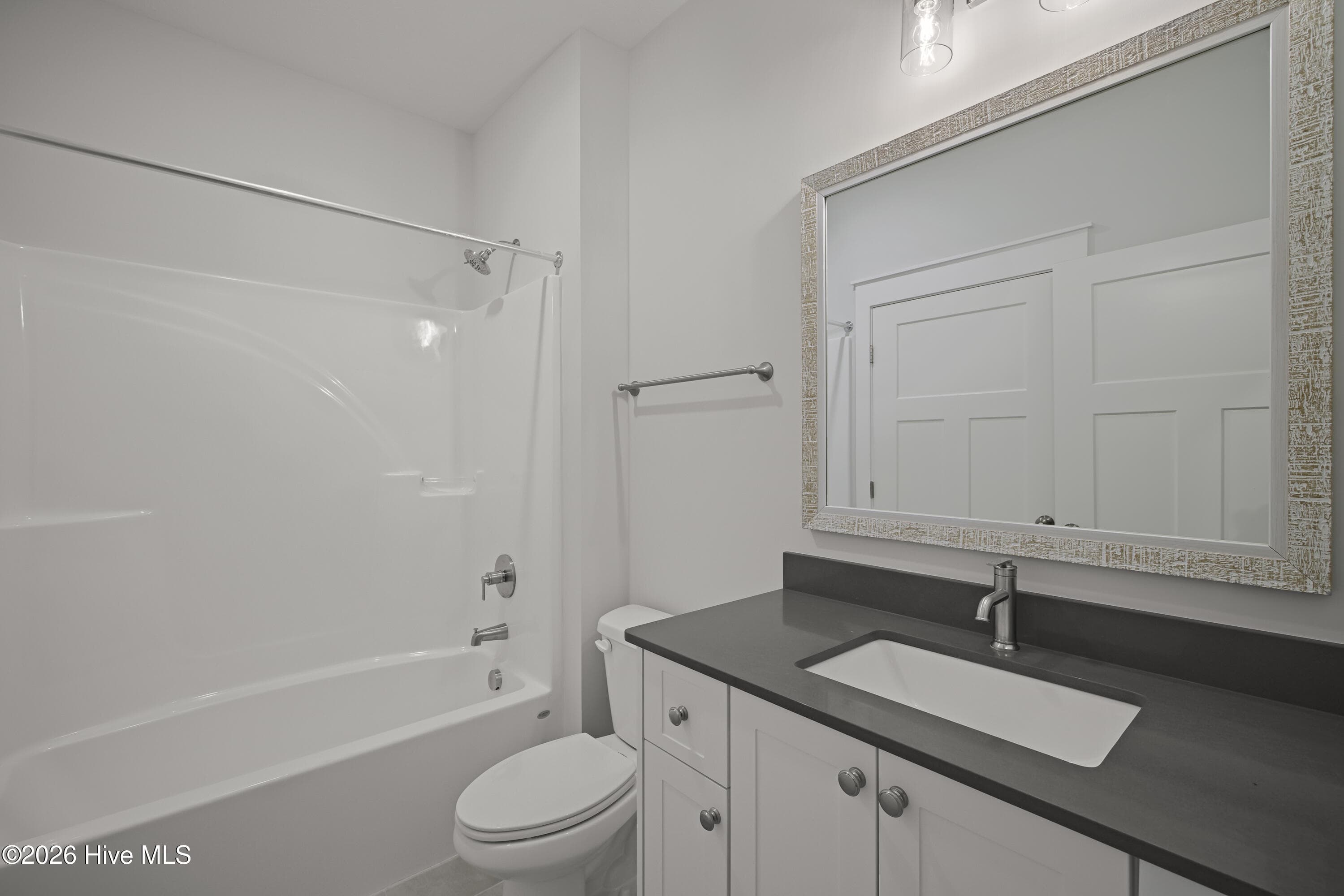 Full bath with access from bedroom 4 and the garage hall - 1096 Bellingham Drive, Beech Island, SC 29842