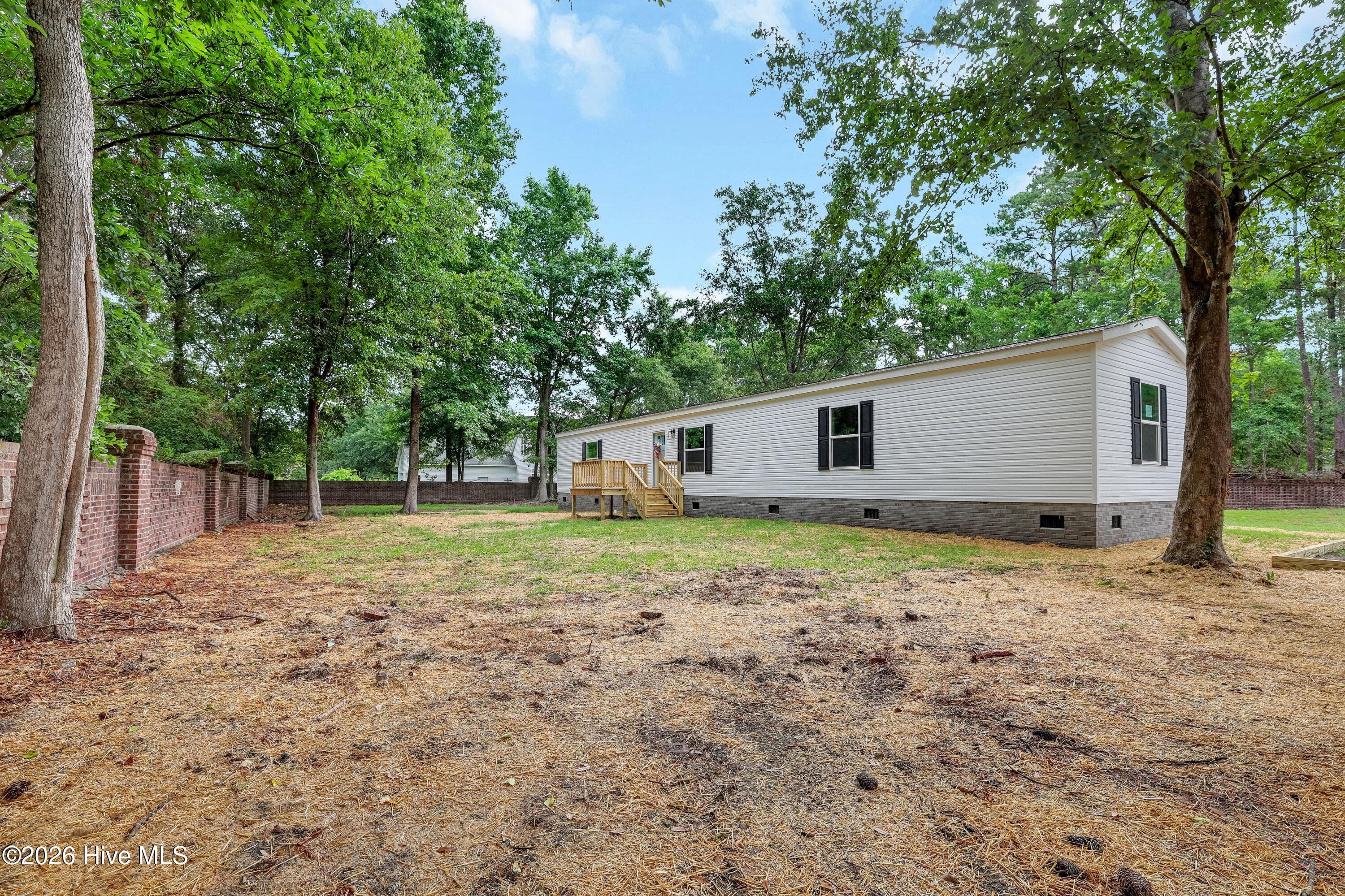 Manufactured Home at 9180 Central Boulevard SE, Winnabow, NC 28479, photo 2 of 32
