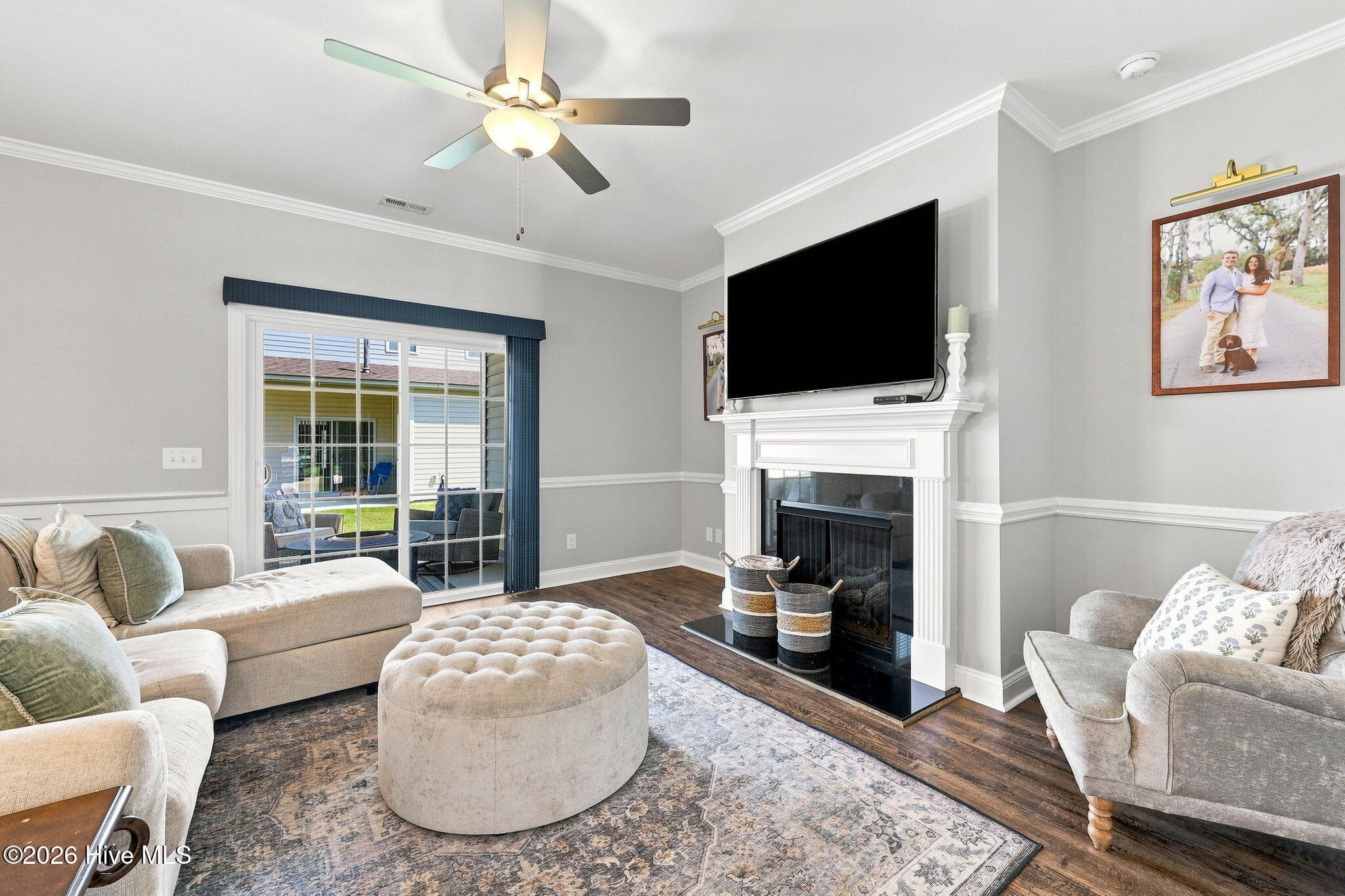fireplace, tv hook up above. Sliding doors to covered porch - 3516 Richter Way A, Greenville, NC 27834