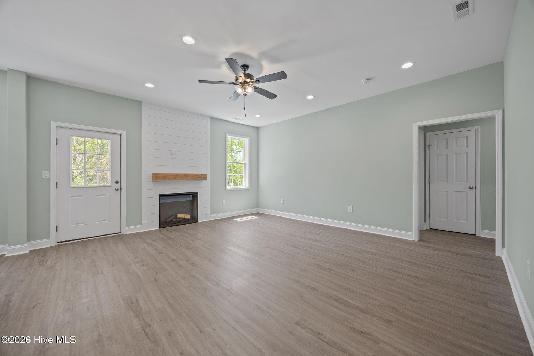 Living room with electric fireplace - 7407 Archers Creek Court, Emerald Isle, NC 28594, Emerald Isle