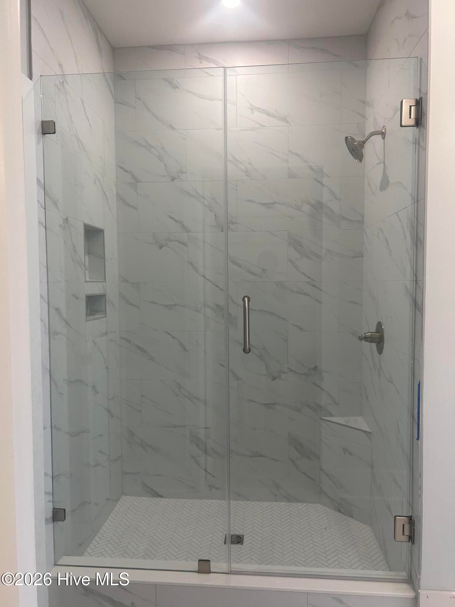 Primary Bathroom with fully tiled, spacious walk-in shower - 5202 Moonshell Loop, Wilmington, NC 28412
