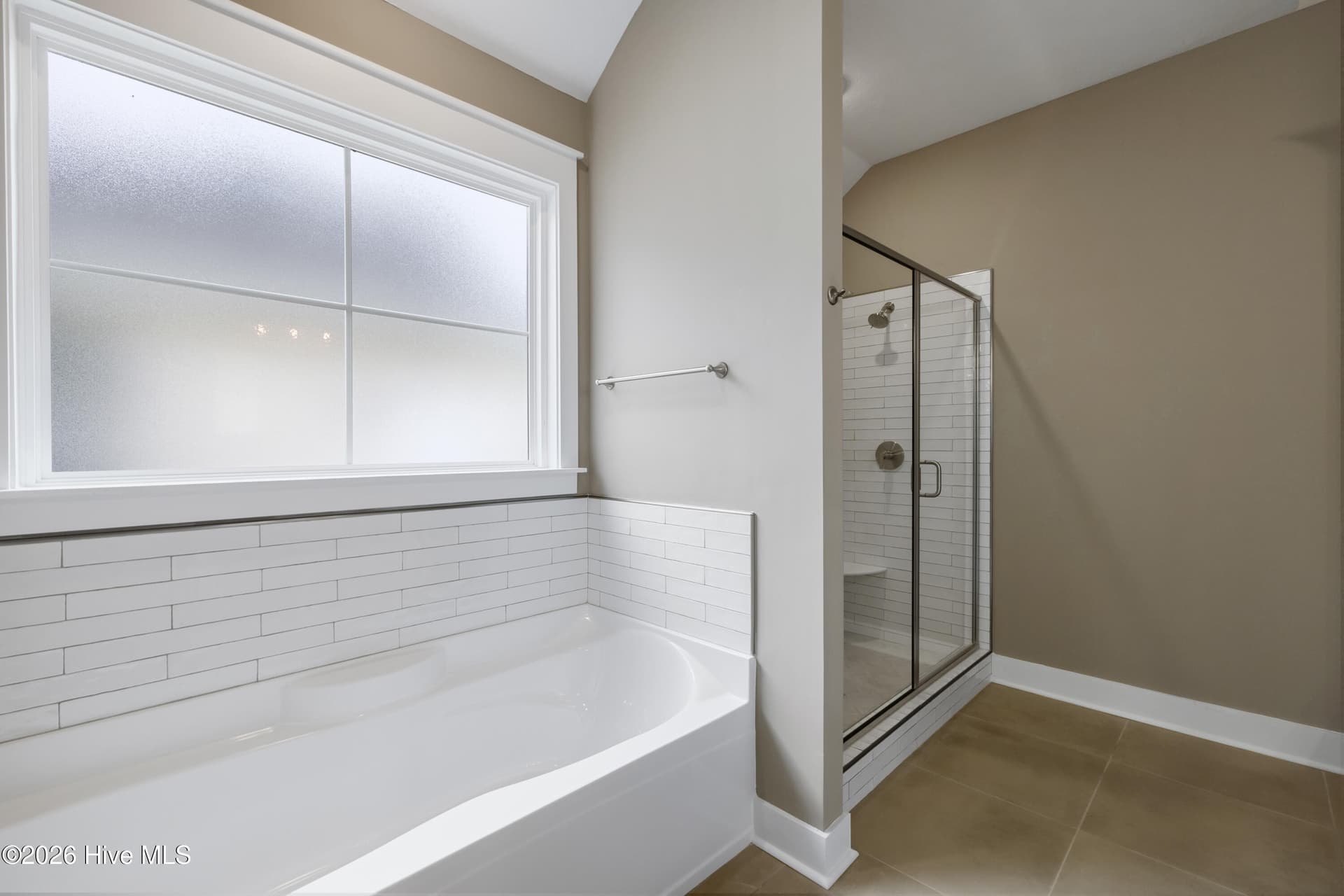 Relaxing tub with a tile surround - 1200 Bellingham Drive, Beech Island, SC 29842