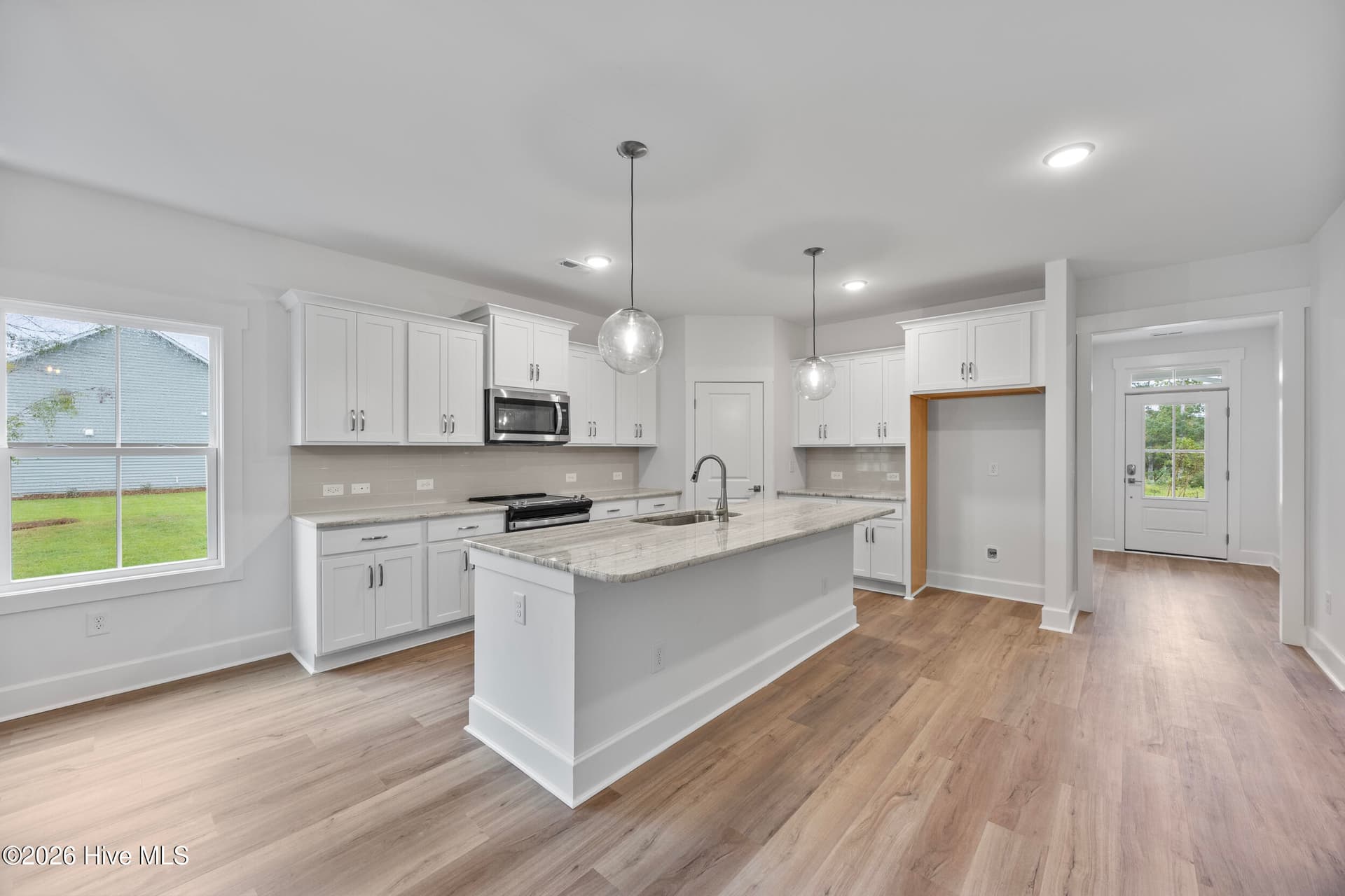 Home shown is a representation of the floor plan and may include optional features or upgrades. Elevations, materials, colors, finishes, square footage, and included features may vary from the actual home. Please consult a Sales Representative for complete details. - 4491 Village Green Drive SW Homesite 93, Shallotte, NC 28470