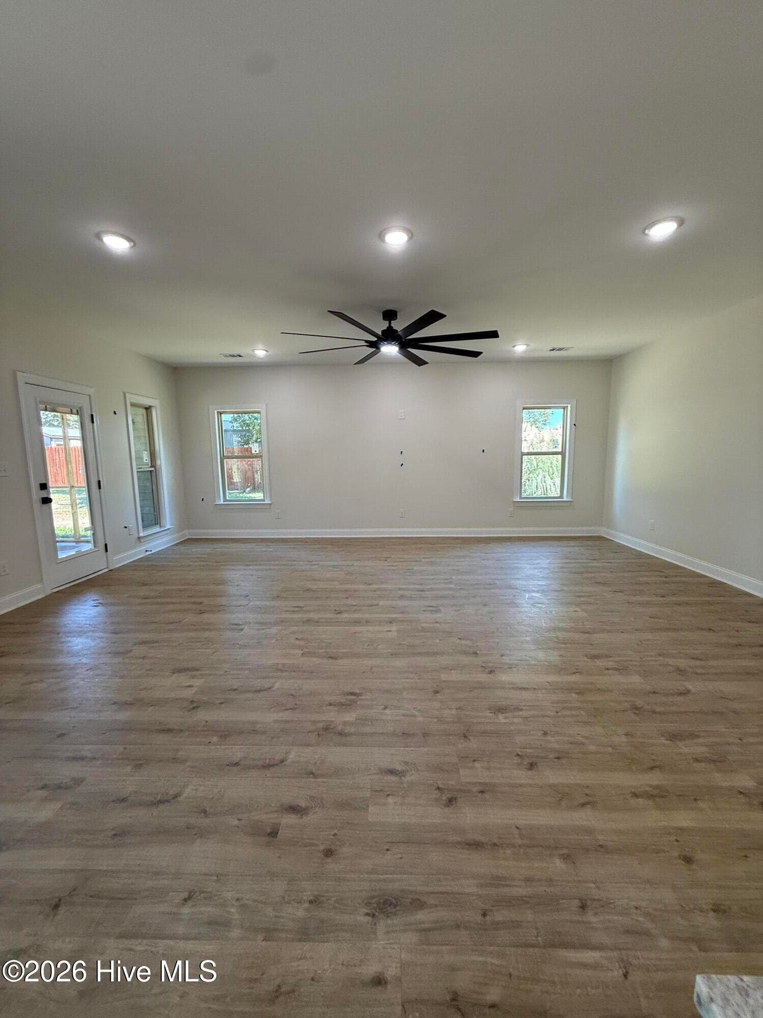 Family Room with big ceiling fan - 111 E Quaker Road E, Wrens, GA 30833