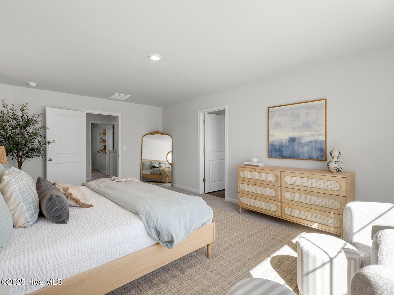 primary bedroom showcases a king size bed for reference - 650 Forecastle Lane Lot 98, Jacksonville, NC 28546