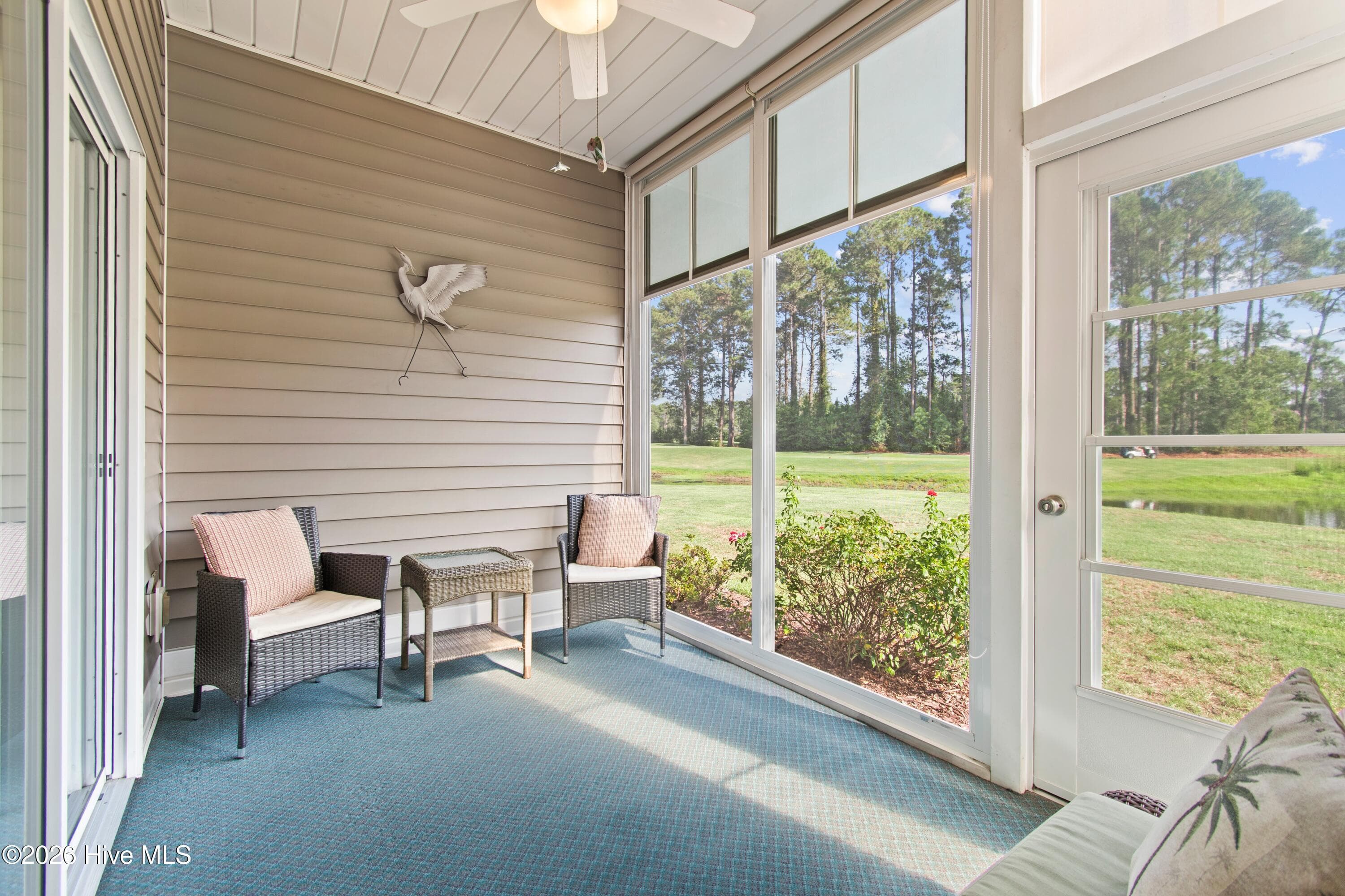 Screened porch with 4 season easy breeze window package - 940 Great Egret Circle SW # 2, Sunset Beach, NC 28468