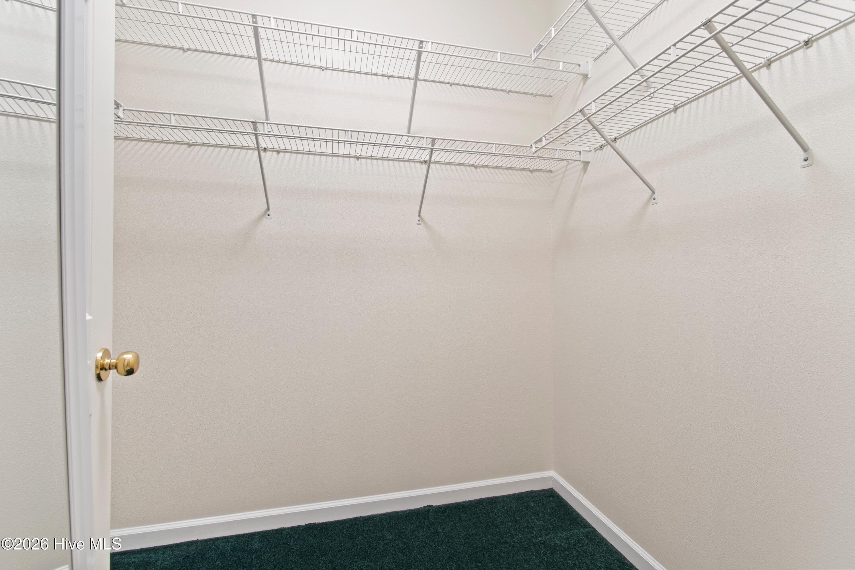 Primary suite walk in closet - 940 Great Egret Circle SW # 2, Sunset Beach, NC 28468