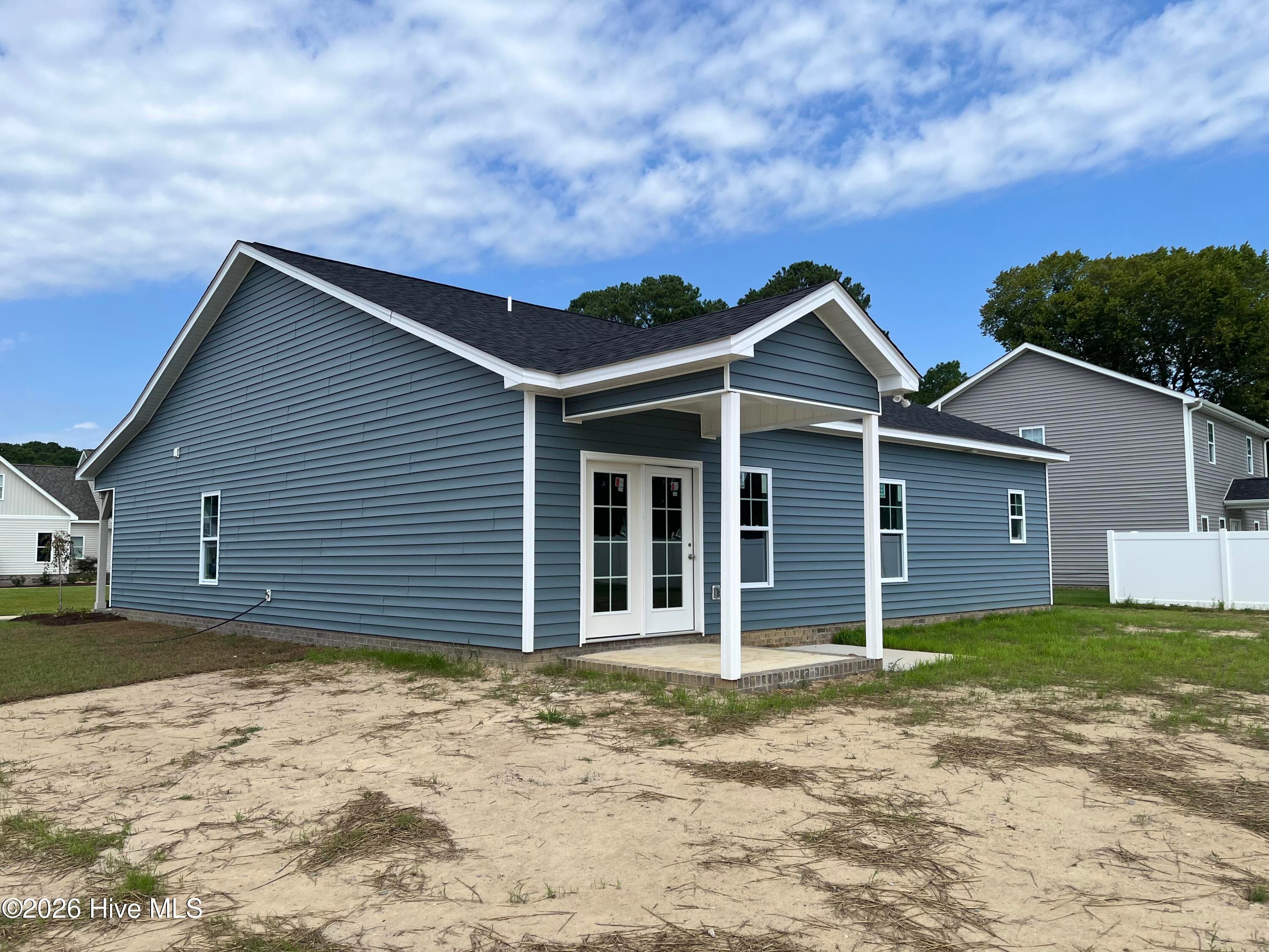 covered patio off kitchen , easy for those dinners on the grill ! - 3229 Meadow Drive, Farmville, NC 27828