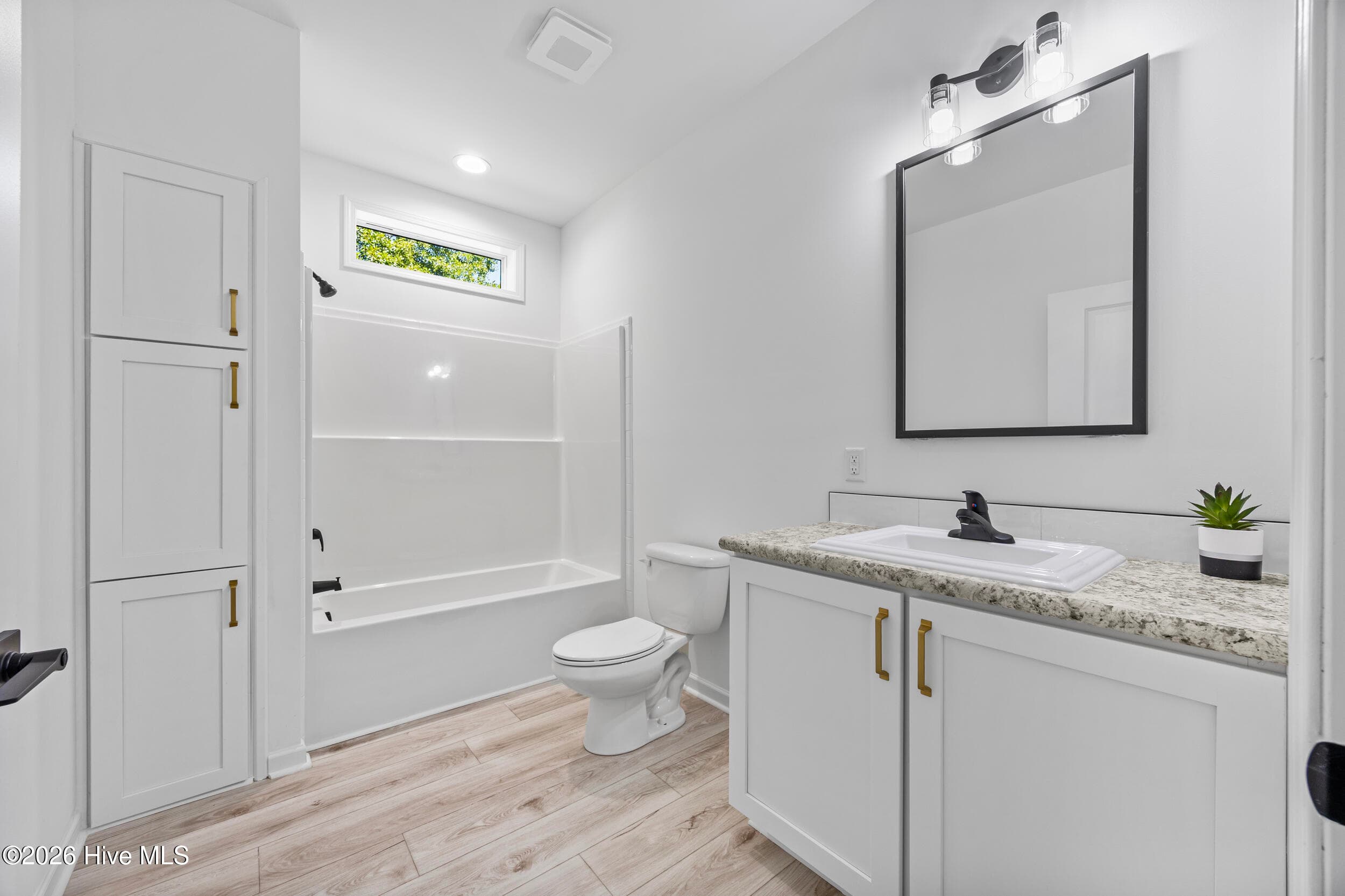 Tub and shower with linen closet - 771 Factory Road, Hampstead, NC 28443