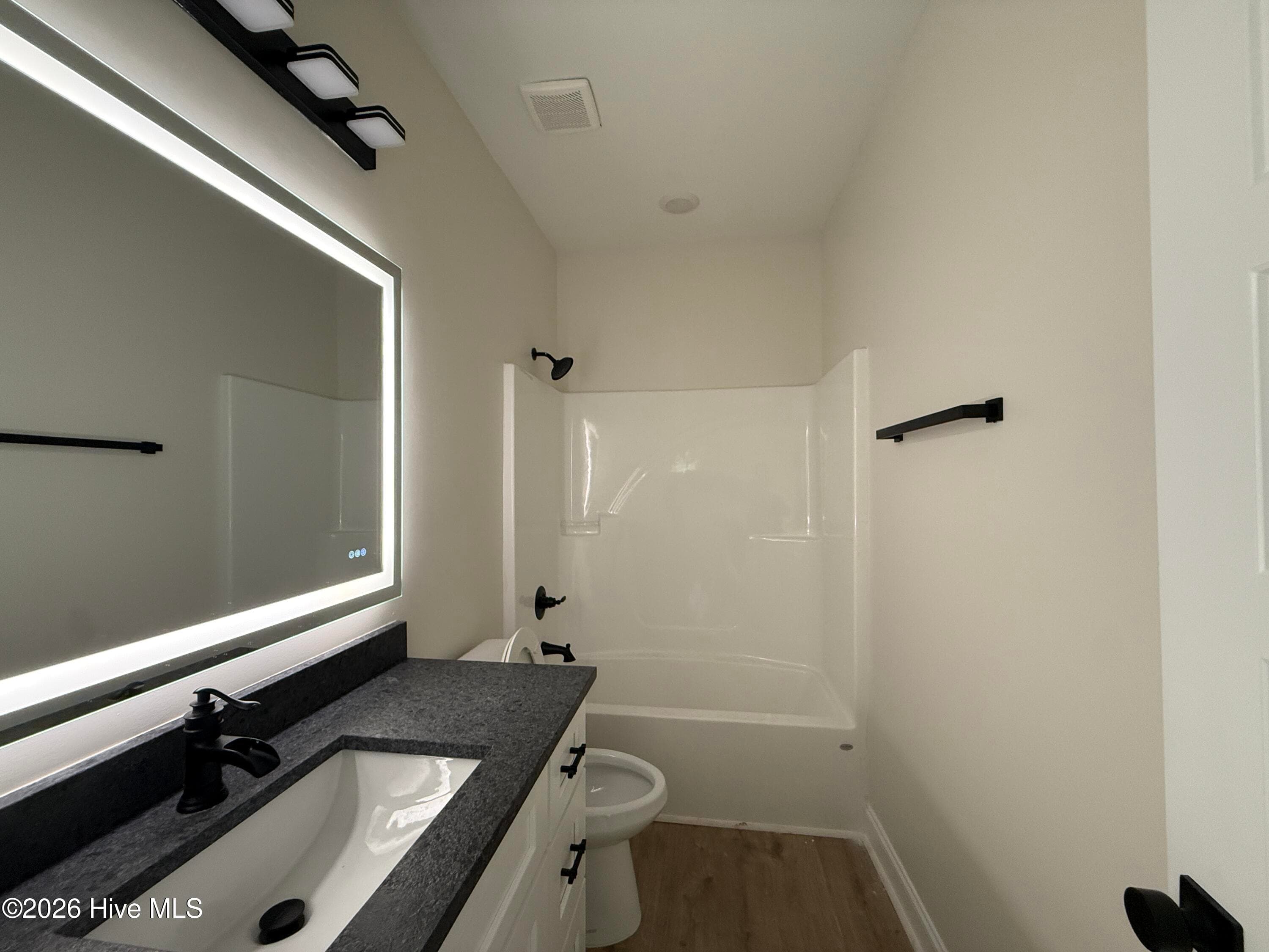 Hall Bathroom with large mirrow - 111 E Quaker Road E, Wrens, GA 30833