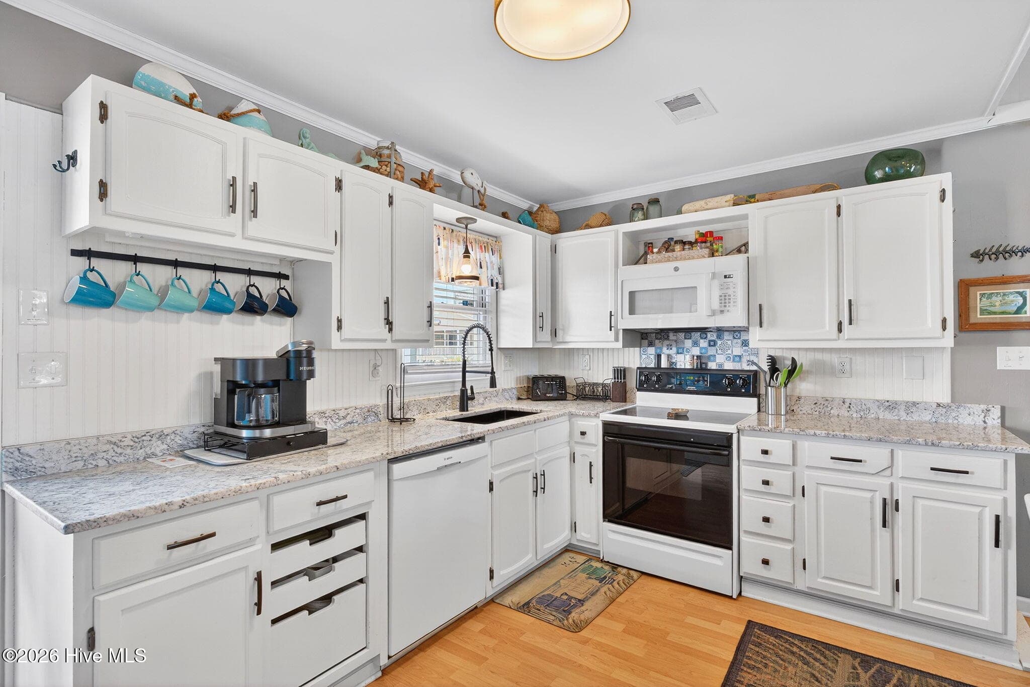 Single Family Residence at 802 W Main Street, Sunset Beach, NC 28468, Sunset Beach, photo 2 of 3