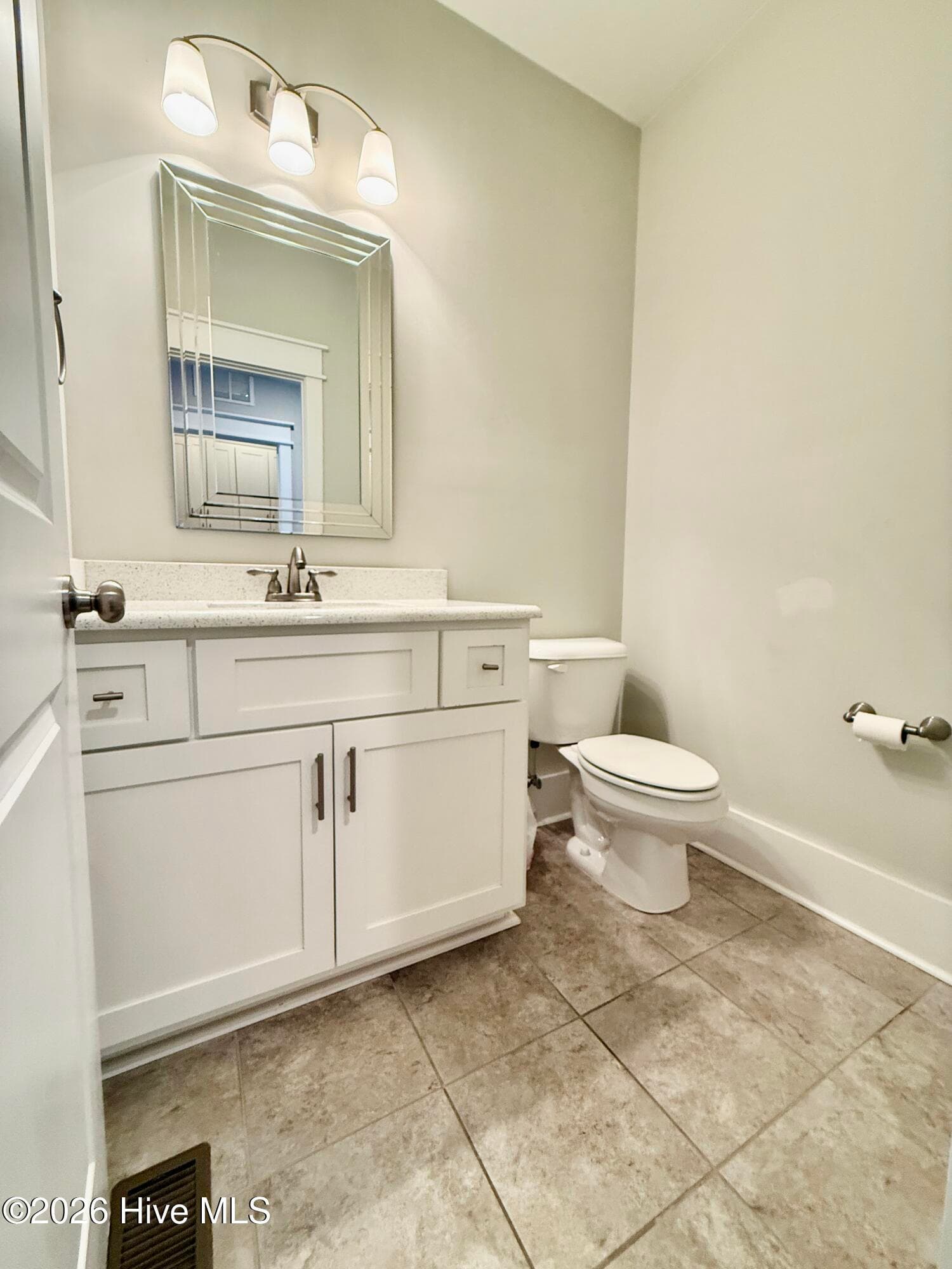 Primary level half bath - 24 Banning Drive, Whispering Pines, NC 28327