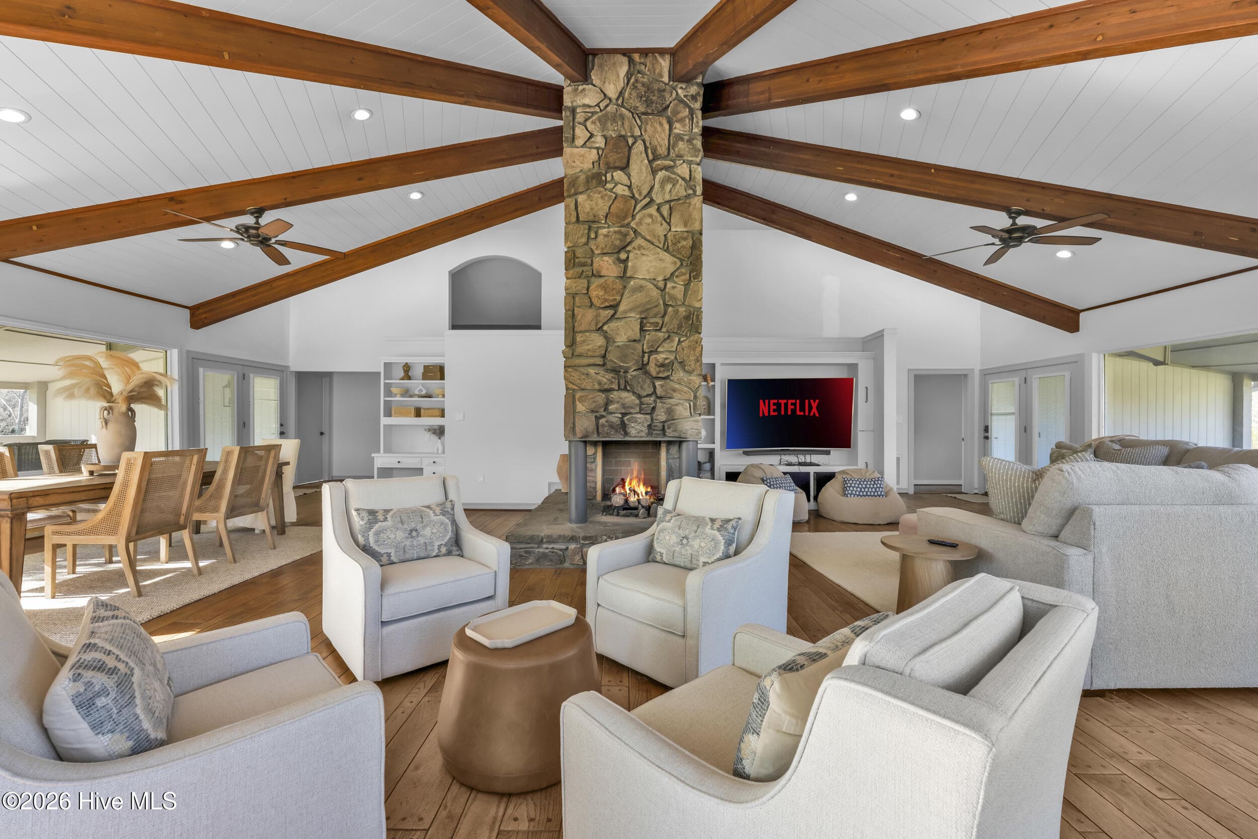 Entertainment area with Central stone fireplace with gas logs - 401 S Lake Drive, Thomson, GA 30824