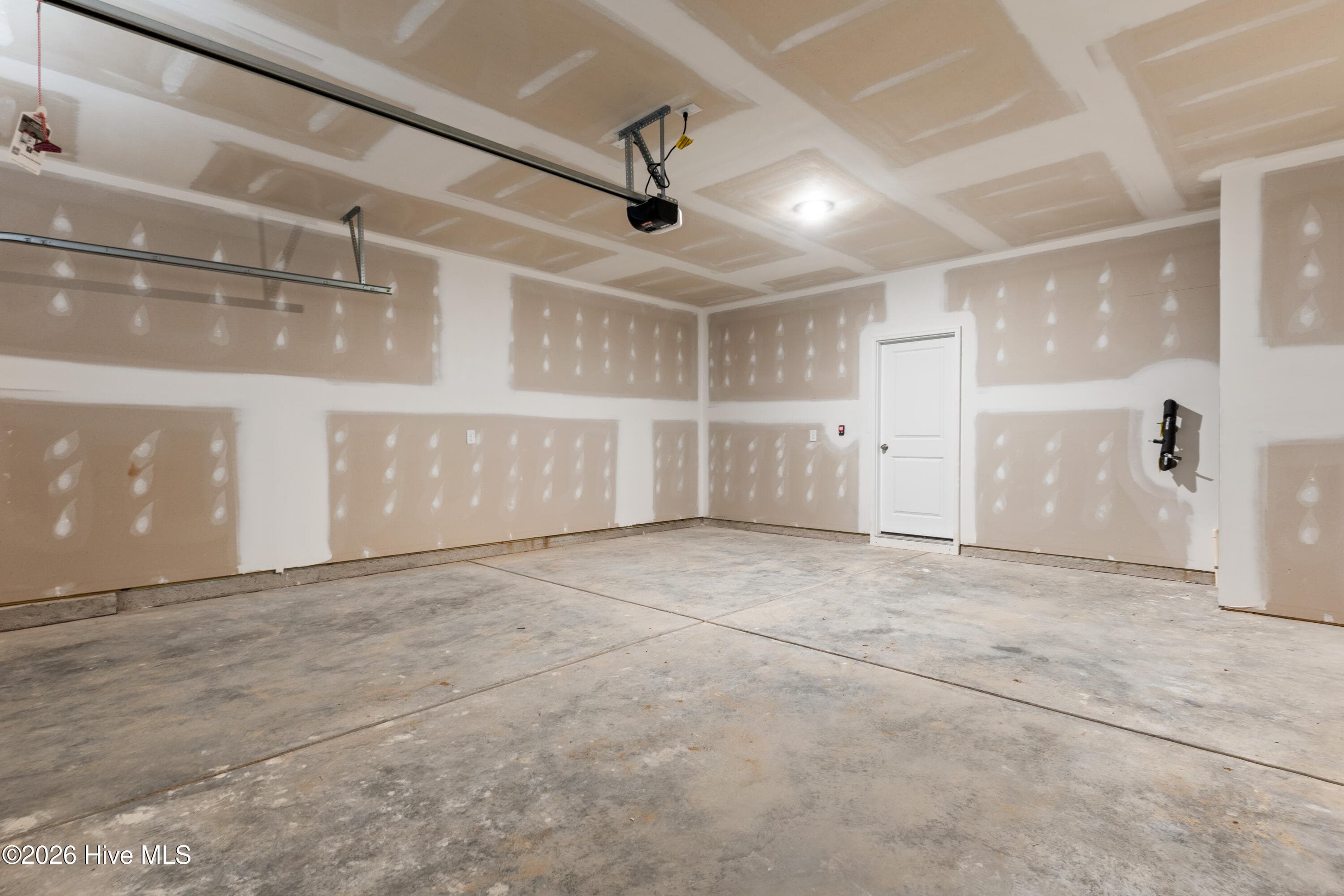 Comes with garage door opener and two remotes. - 148 N Squires Run Lane, Richlands, NC 28574