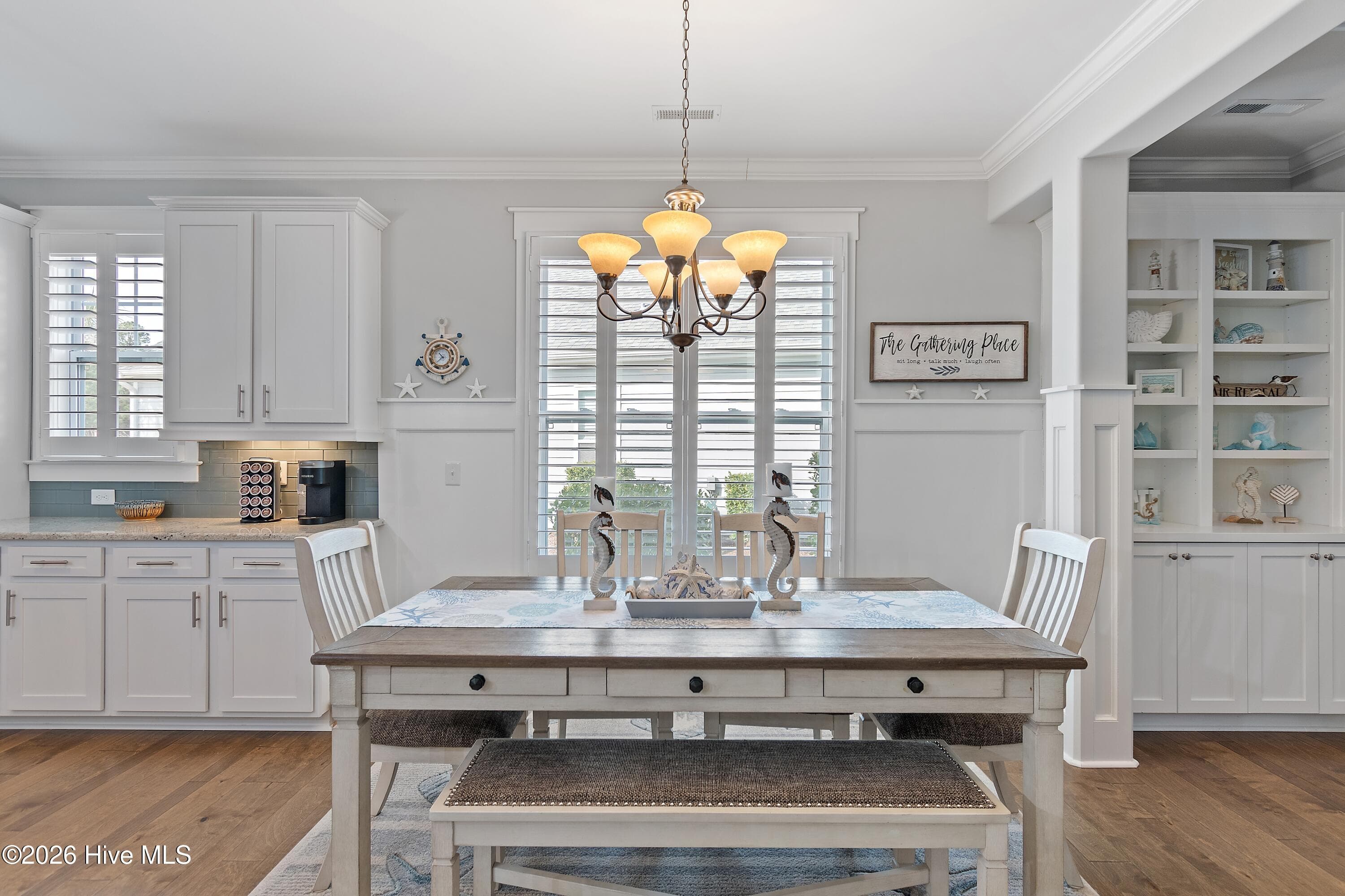 Wainscoting, upgraded trim and large dining area. - 6358 Bryson Drive SW, Ocean Isle Beach, NC 28469
