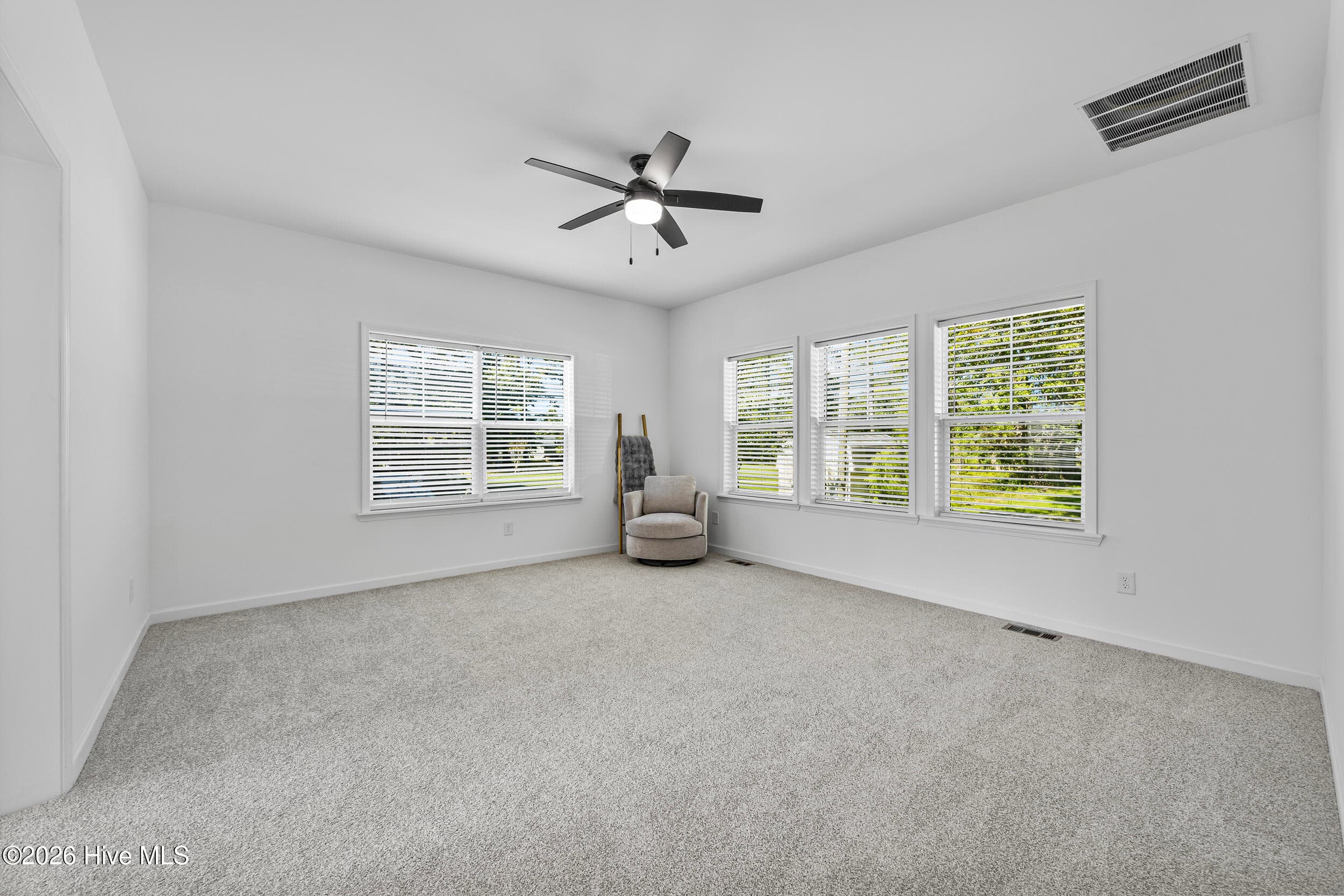 Located between bedroom 2 and 3. Use your imagination...options are endless. - 771 Factory Road, Hampstead, NC 28443