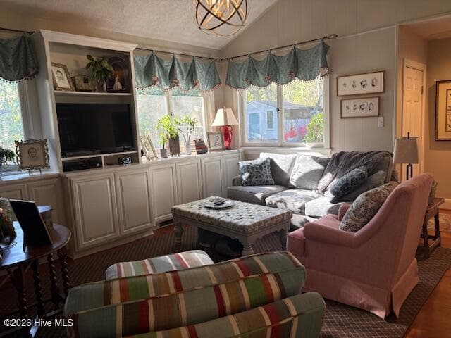 dining room is also open to a cozy den with lots of natural light - 104 Bunn Avenue, Rocky Mount, NC 27804