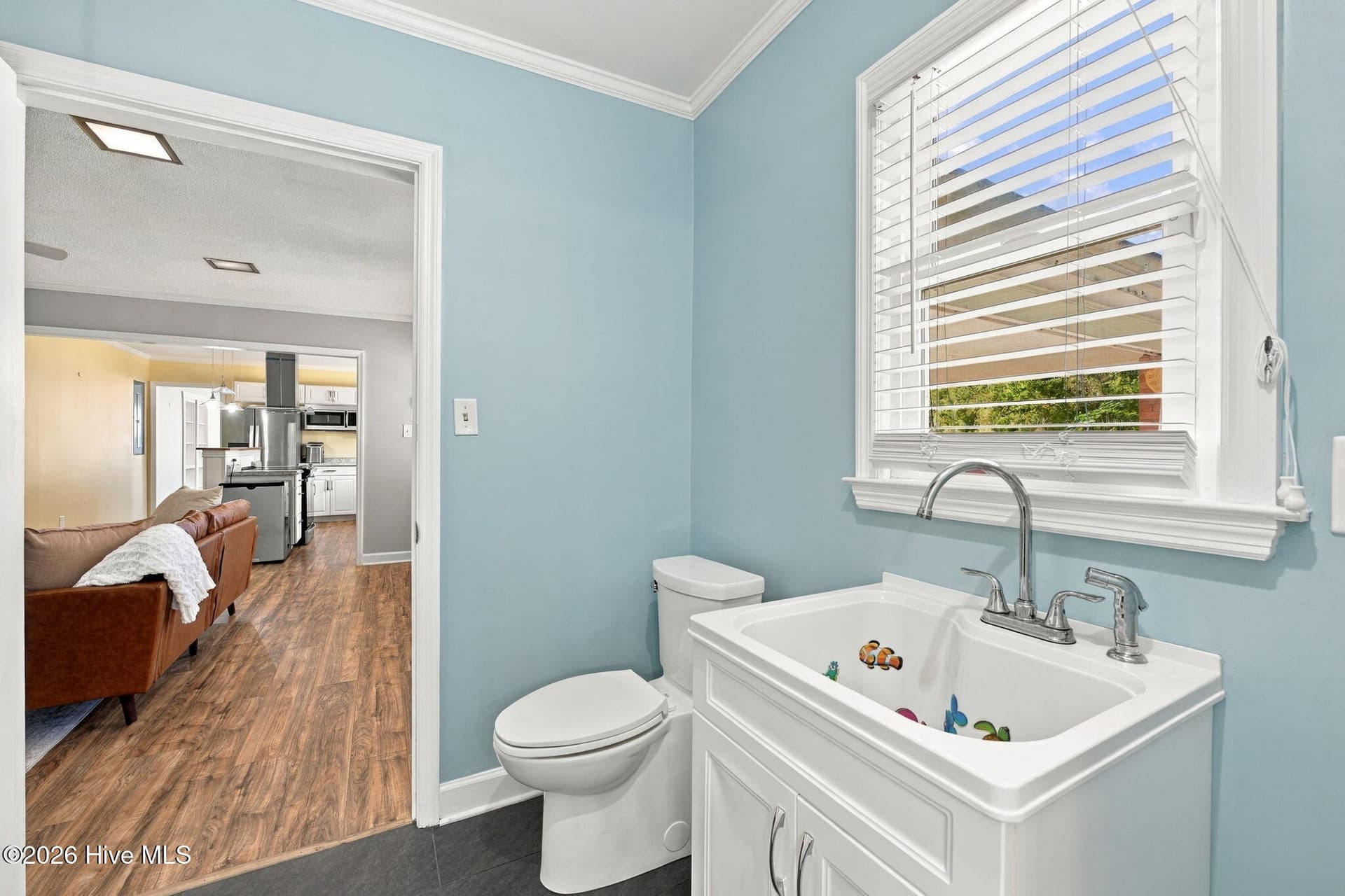laundry room with 1/2 bath - 1405 Antioch Road, New Bern, NC 28560