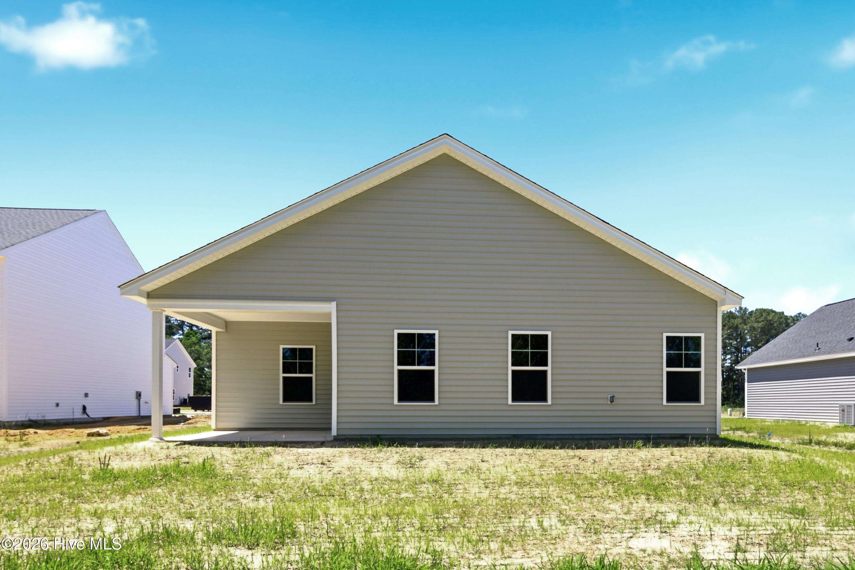 Example photo of similar home. Actual home is under construction and will feature a rear, screened-in, covered porch. - 4149 Workman Loop 67, Leland, NC 28451
