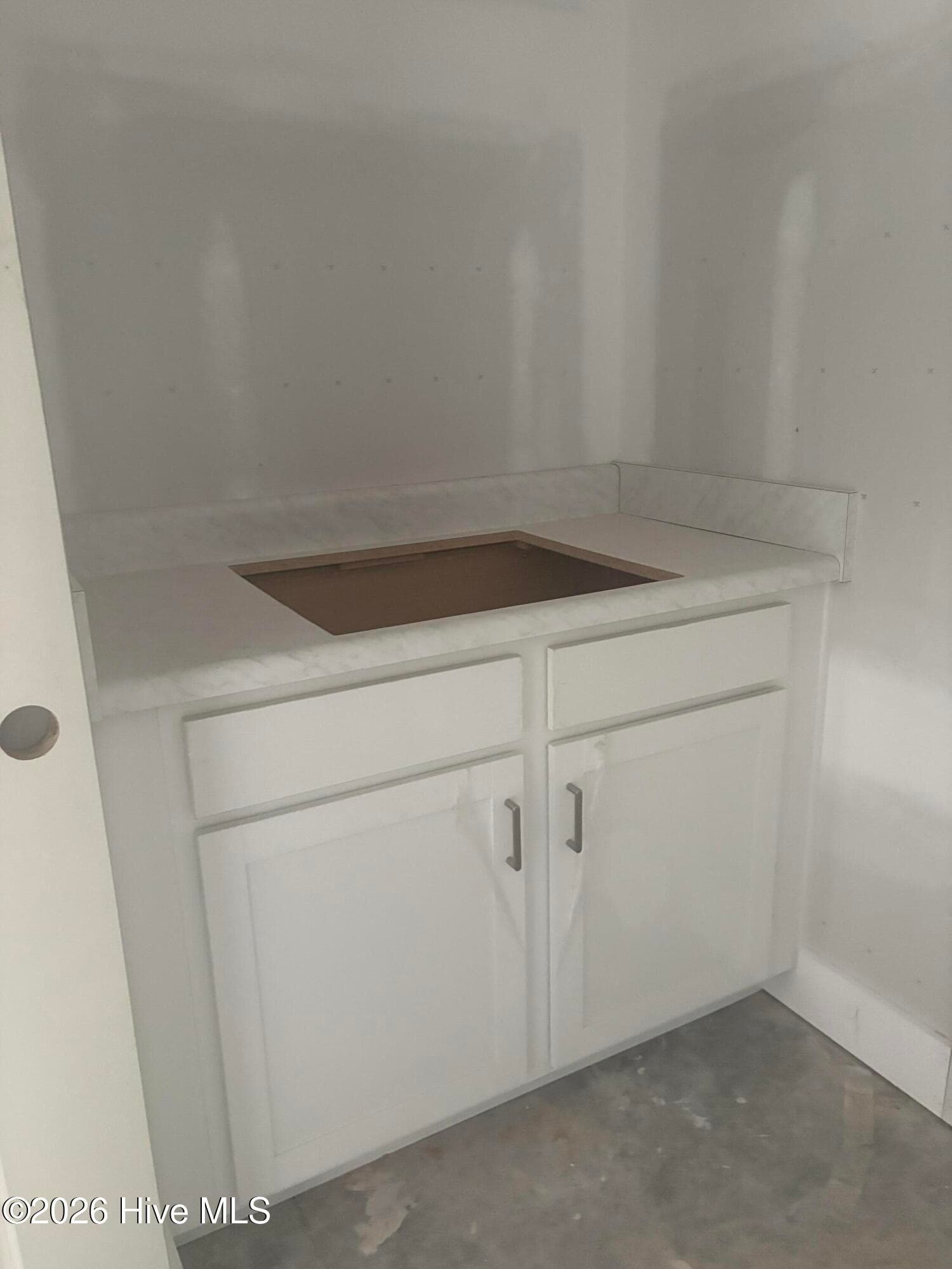 Progress photo of home - Cabinet with Utility sink - 1066 Rock Skipper Road, Ocean Isle Beach, NC 28469