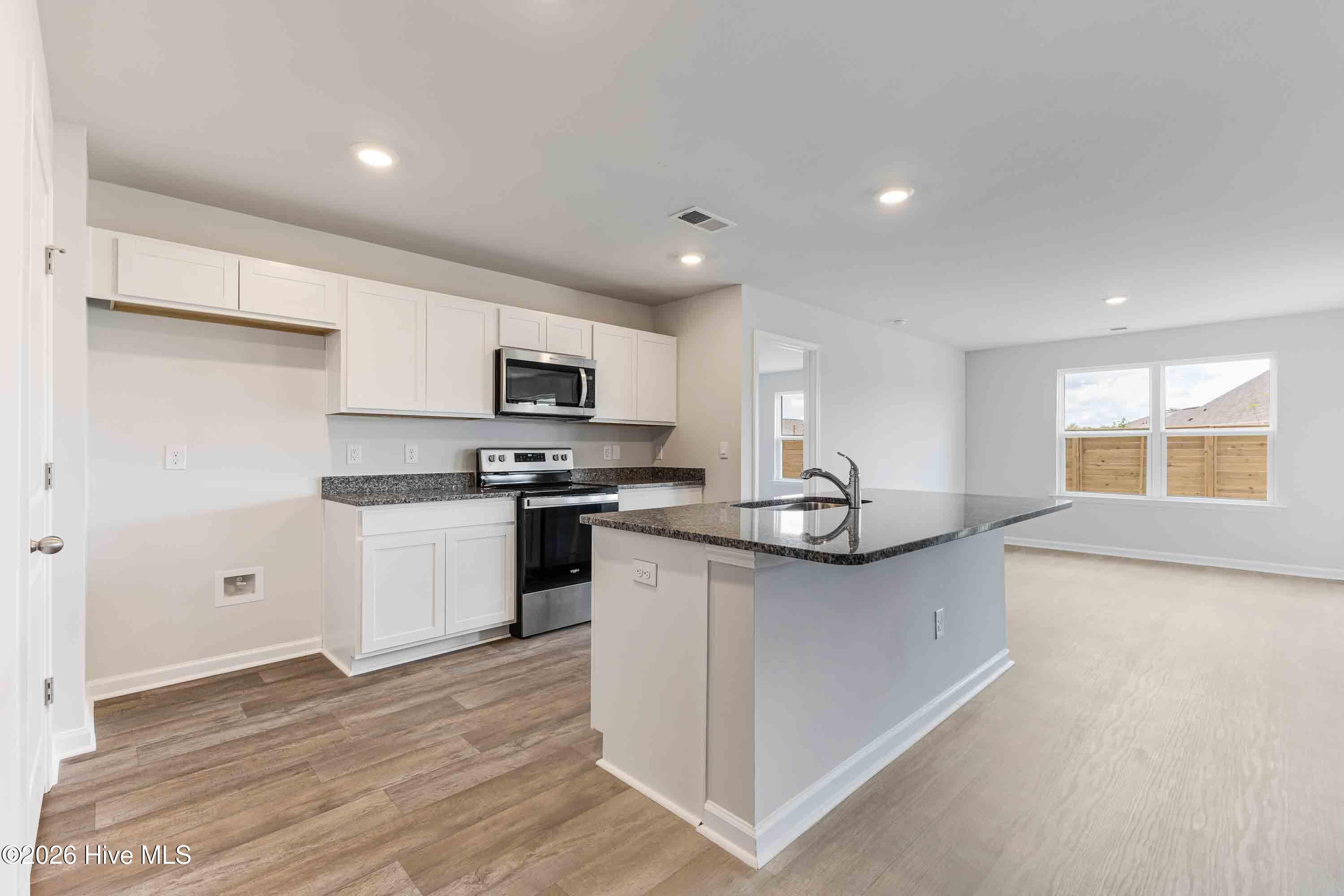 Photos are of a similar, completed home. Actual colors may vary - 3085 Golden Field Drive SE Lot 78, Bolivia, NC 28422