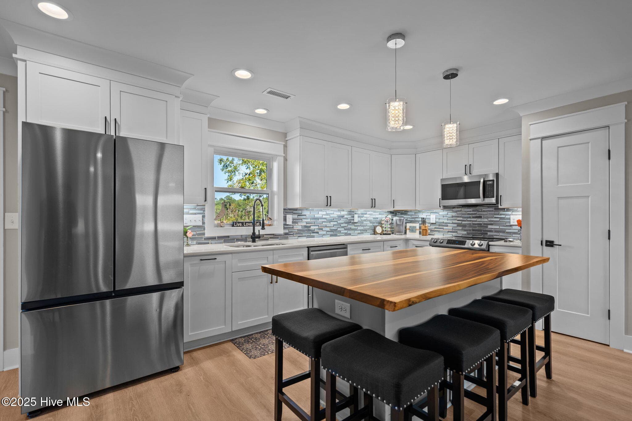 KITCHEN WITH GORGEOUS WOOD COUNTER ISLAND - 2037 Oxpen Road SW, Supply, NC 28462