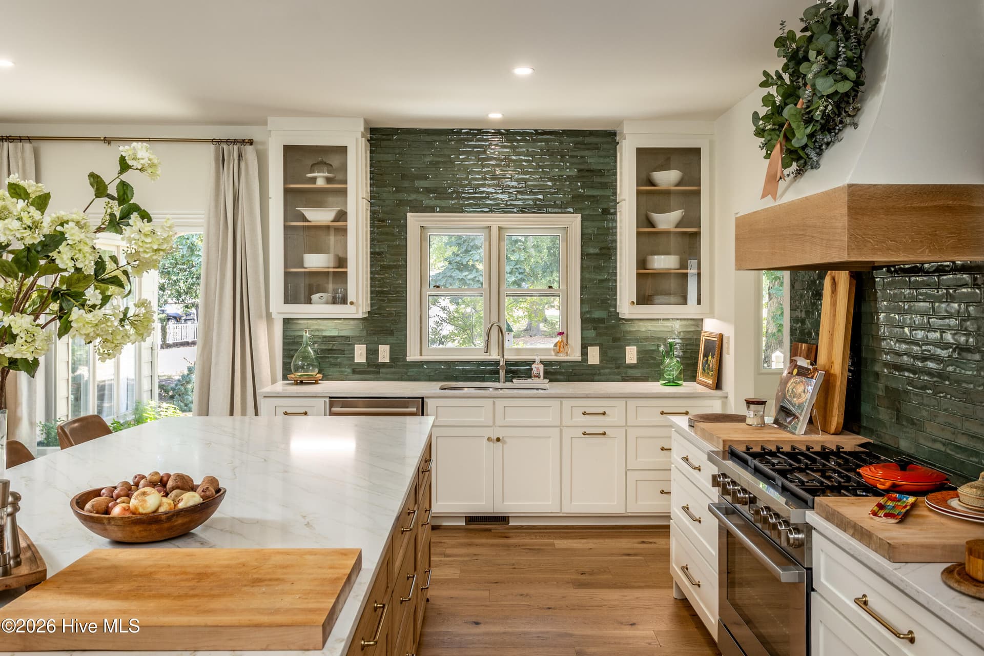 All new kitchen, plumbing and lighting throughout the home. This kitchen is a stunner as is the rest of the home! - 5050 Country Club Drive N, Wilson, NC 27896