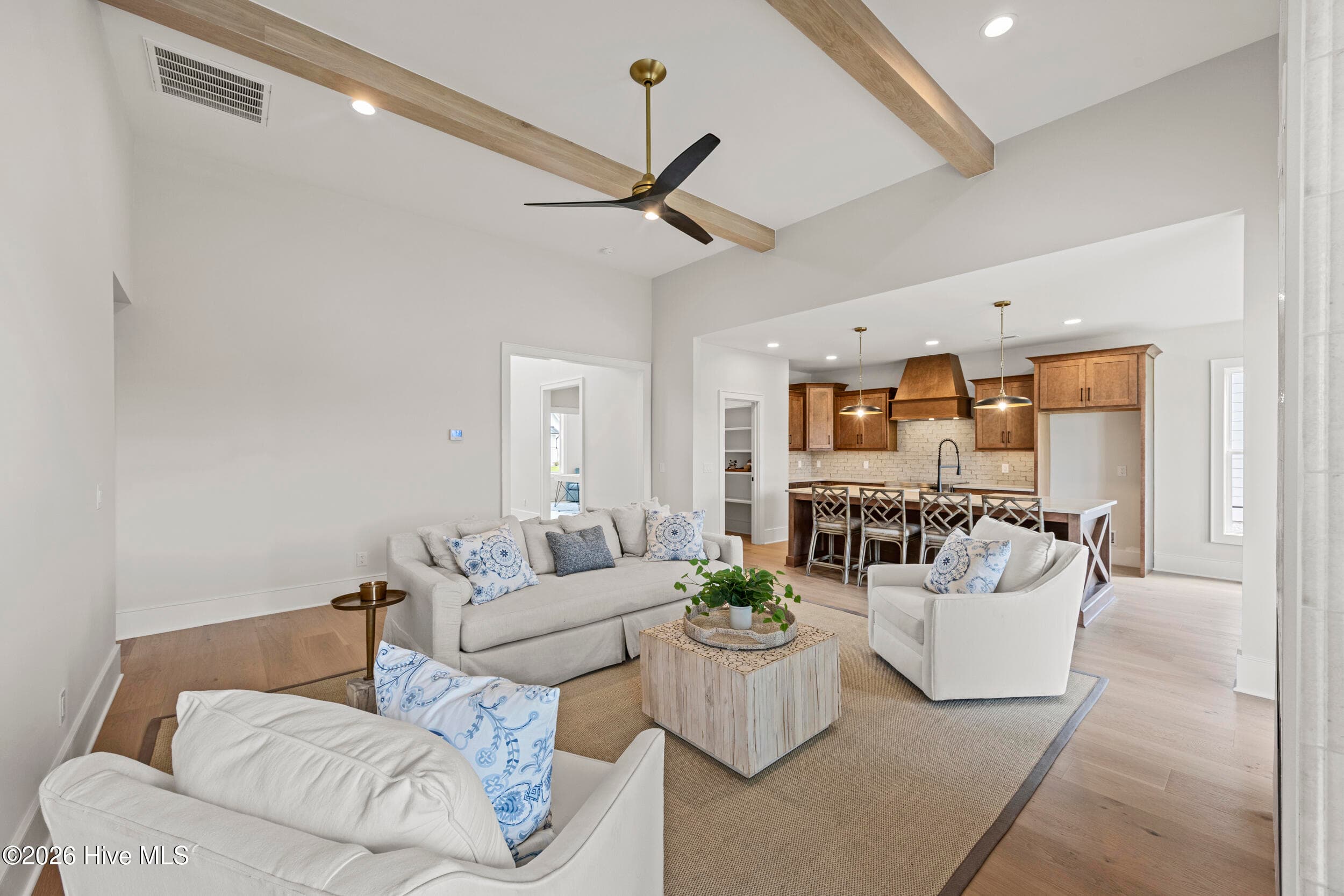 Living room with custom beams - 117 Grand Harvest Court, Wilmington, NC 28411