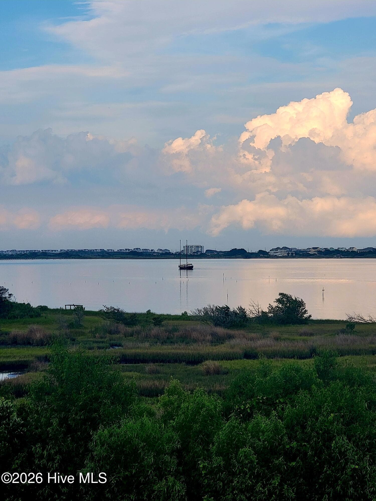 Sailboat viewed from the porch - 401 Caspian Court, Holly Ridge, NC 28445