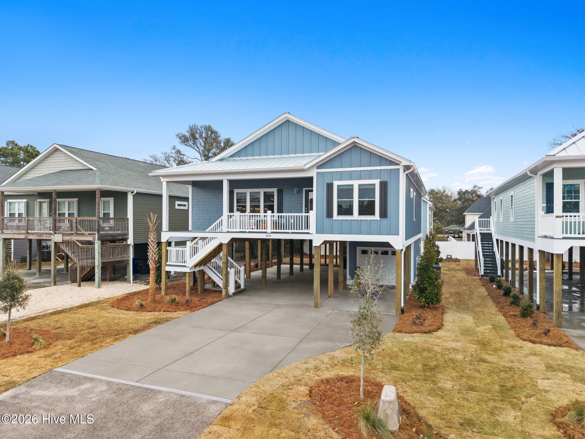Photo is for illustrative purposes only of a similar home of same plan - 310 NE 58th Street, Oak Island, NC 28465