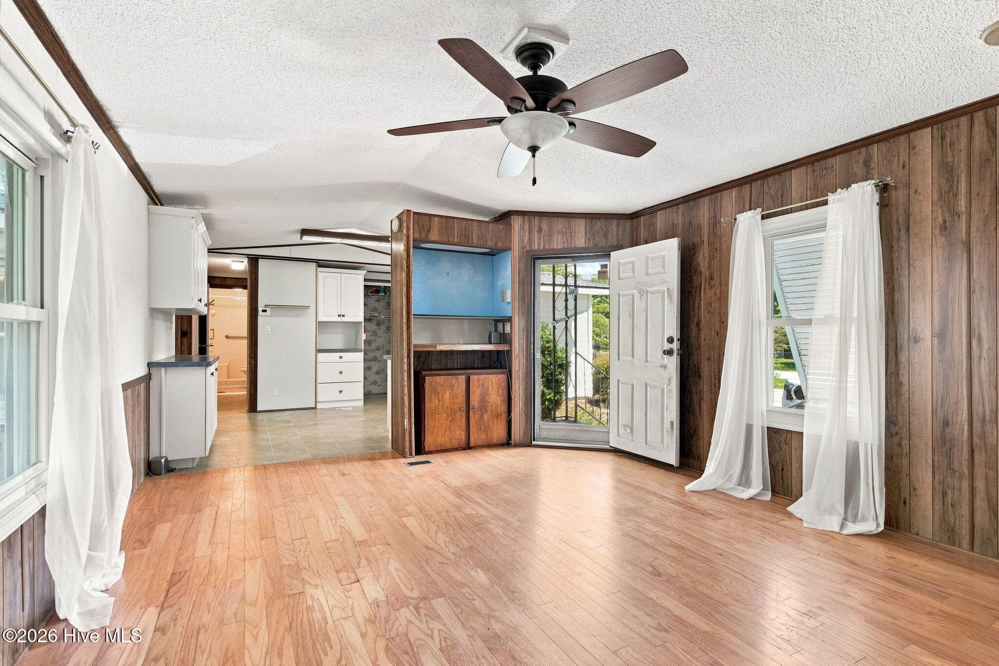 Living room to kitchen - 114 Lejeune Road, Cape Carteret, NC 28584