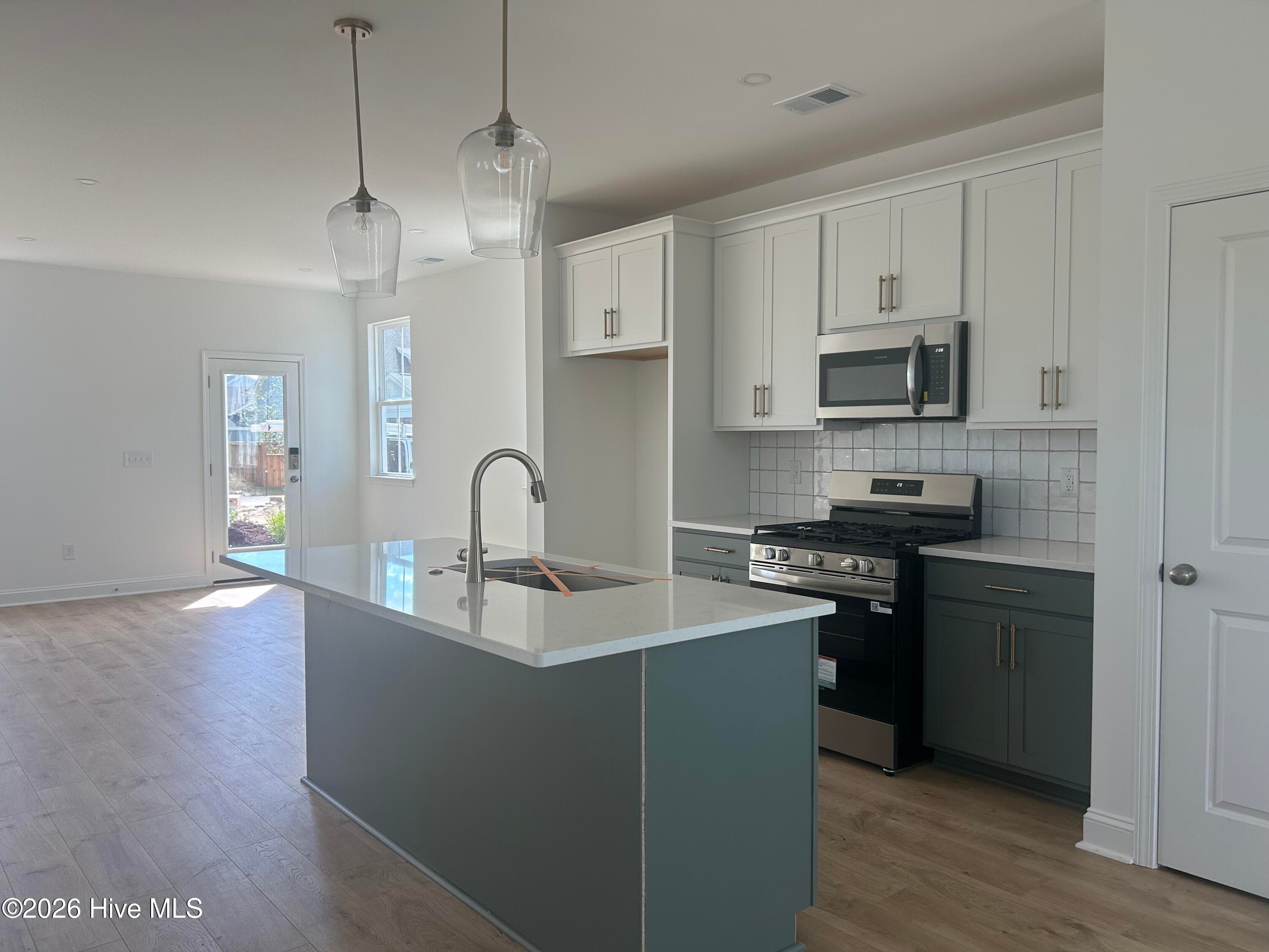Kitchen with quartz countertops - 5446 Folklore Way, Wilmington, NC 28412